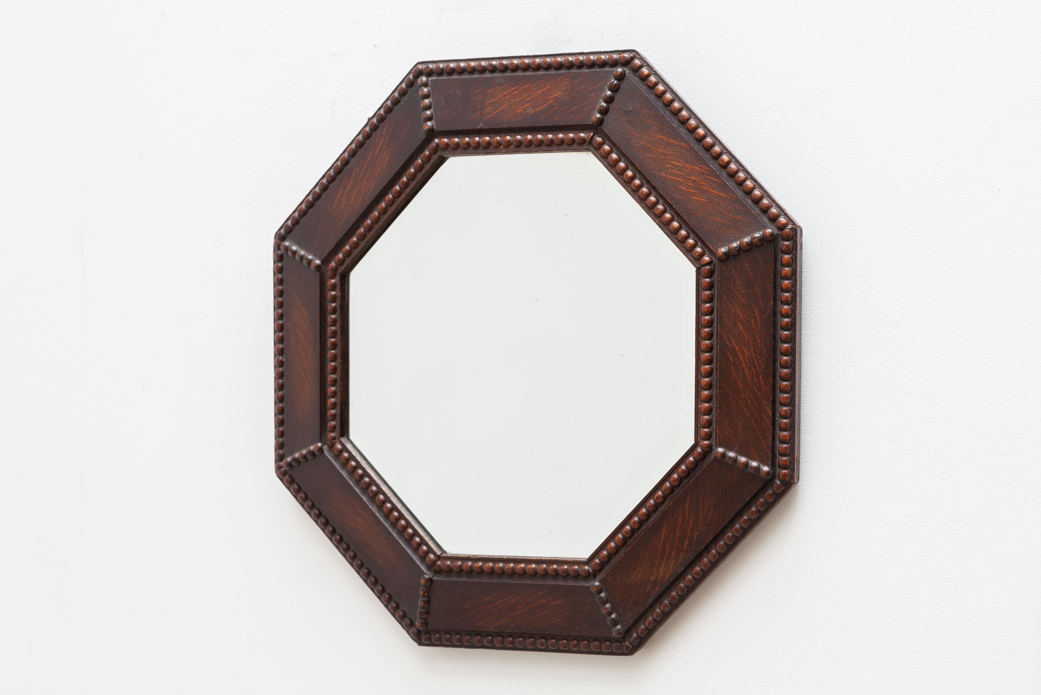 British Octagonal Wall Hanging Beveled Mirror in Oak Framed Art Deco For Sale