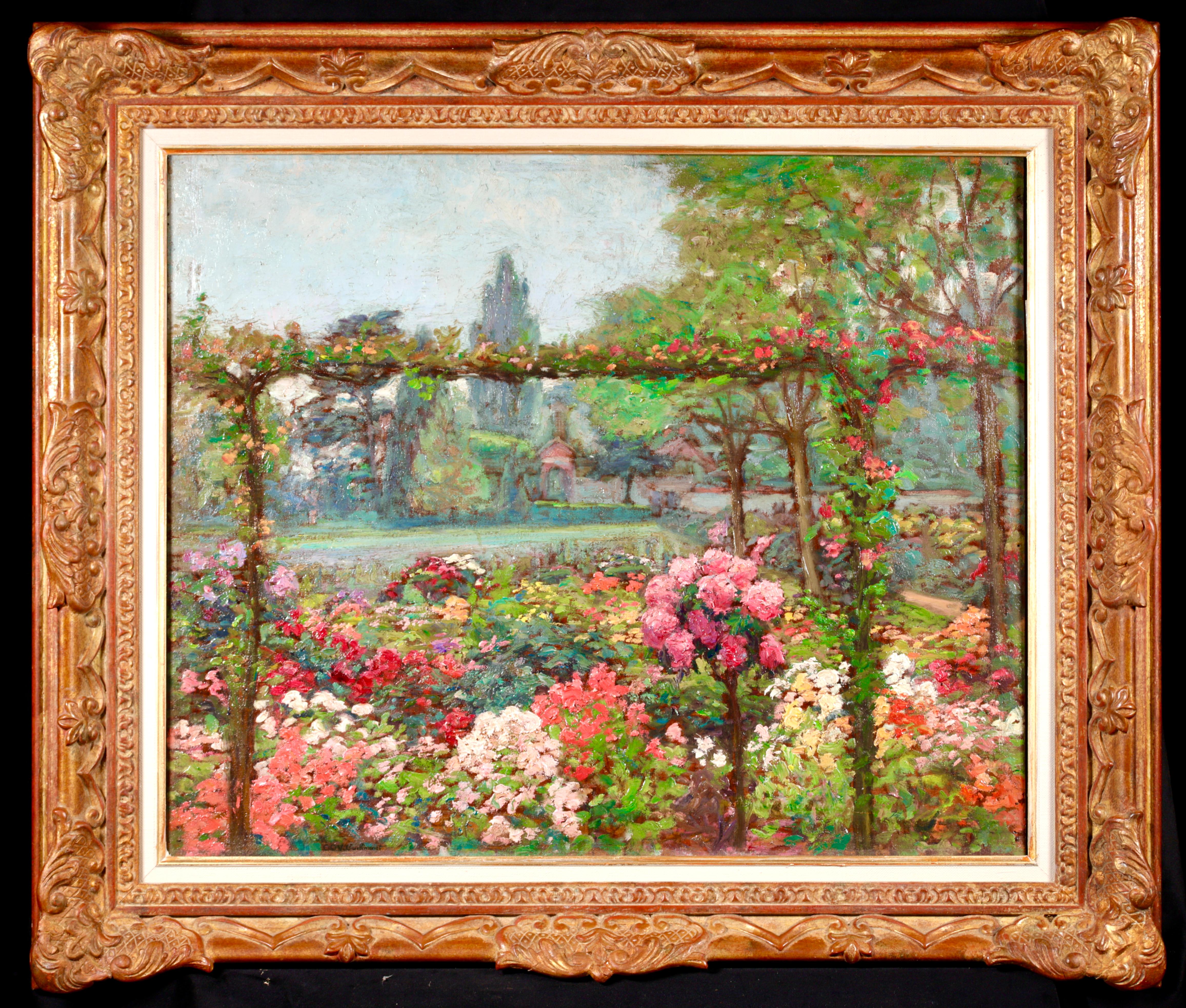 Impresionante óleo postimpresionista sobre tabla firmado hacia 1920 por el pintor francés Emile Octave Denis Victor Guillonnet. La obra representa un jardín de verano lleno de flores vibrantes en rojos, rosas, amarillos y blancos, con césped verde y