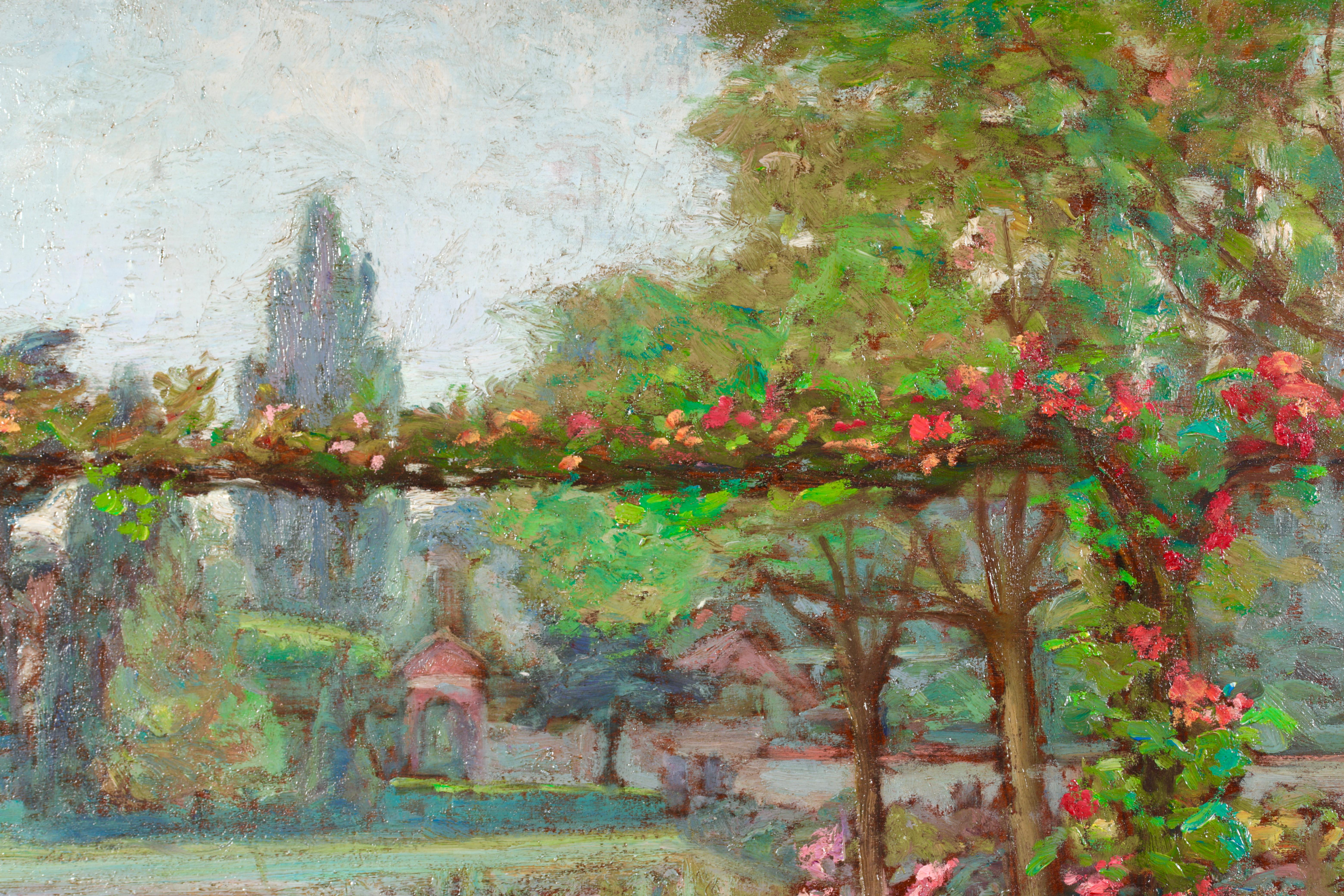 Stunning signed post impressionist oil on panel circa 1920 by French painter Emile Octave Denis Victor Guillonnet. The work depicts a summer garden filled with vibrant flowers in reds, pinks, yellows and whites, with green lawn and trees beyond.