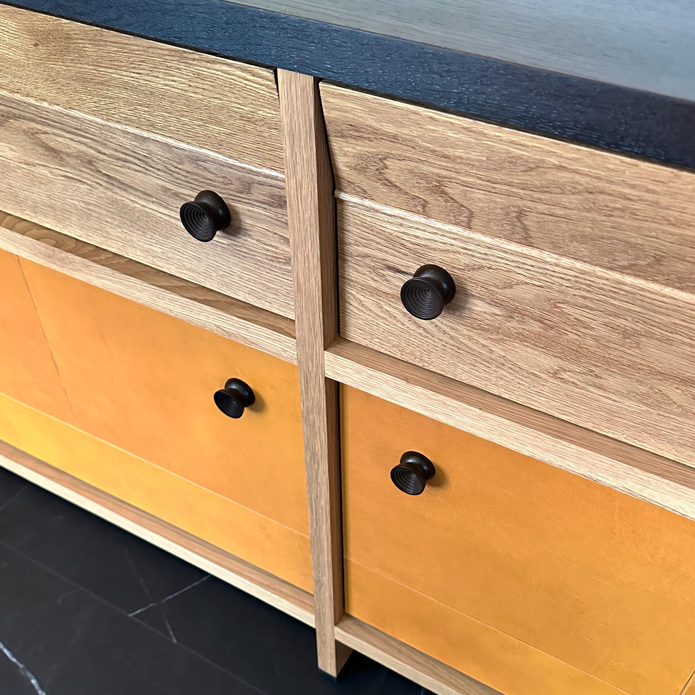 Blackened Octavia solid wood and leather credenza and sideboard by Crump and Kwash  For Sale