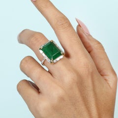 Anello da cocktail con smeraldo dello Zambia a forma di ottagono e diamanti baguette