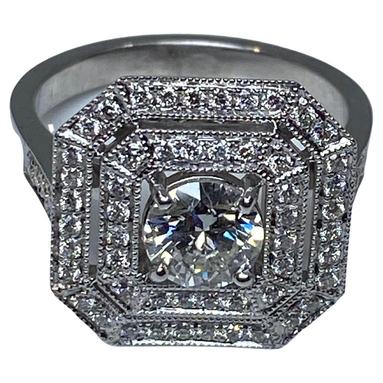 Octogonal Diamond Octogonal engagement ring in 18 carat gold with brilliant cut diamonds ...