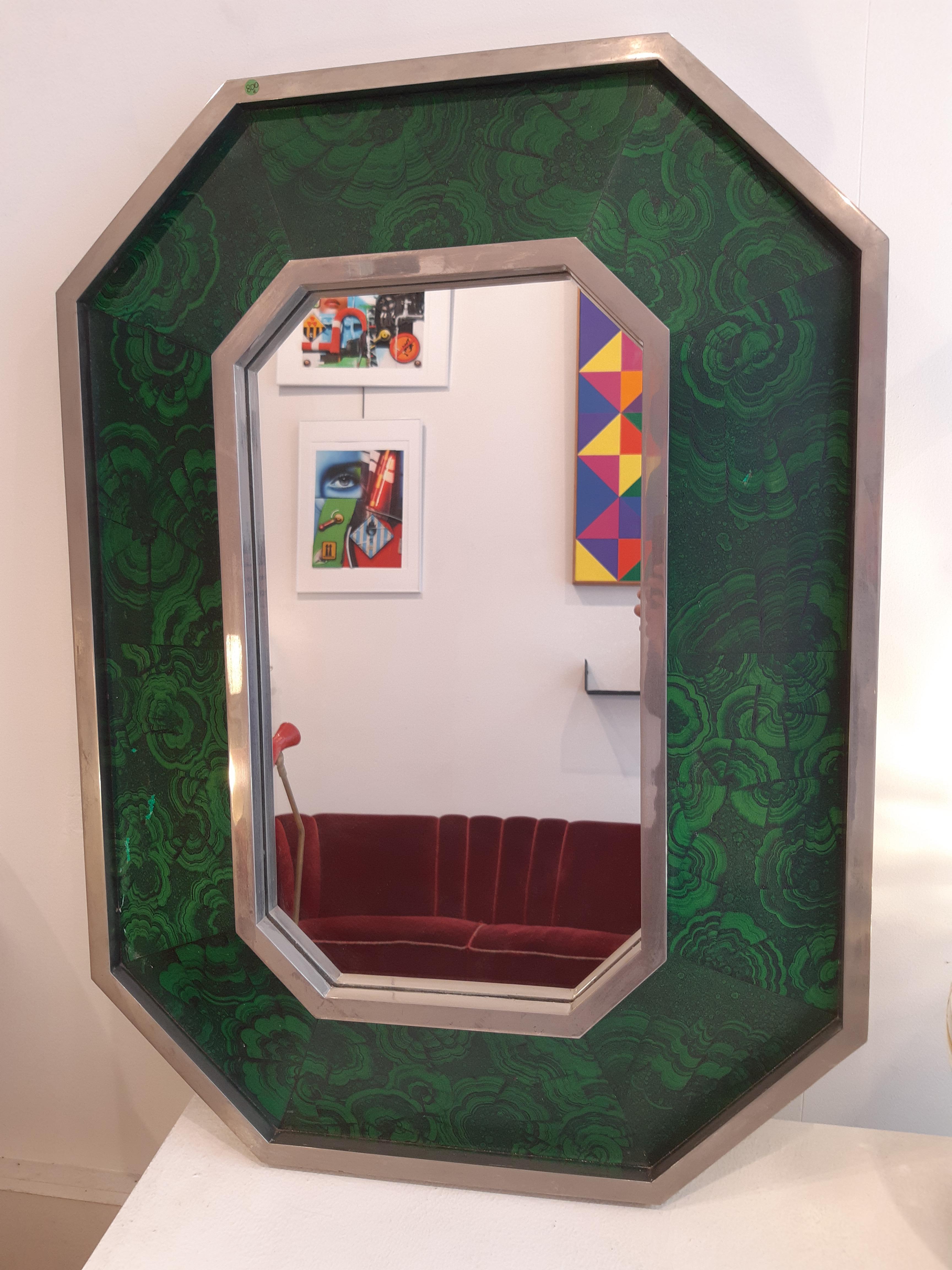 Octogonal mirror, Jansen style 1970s with faux malachite 
Measures: Height 95cm, depth 68cm, width 11cm. 
Scratches on the bottom left and a tiny at the top right
Very elegant mirror with great dimensions.