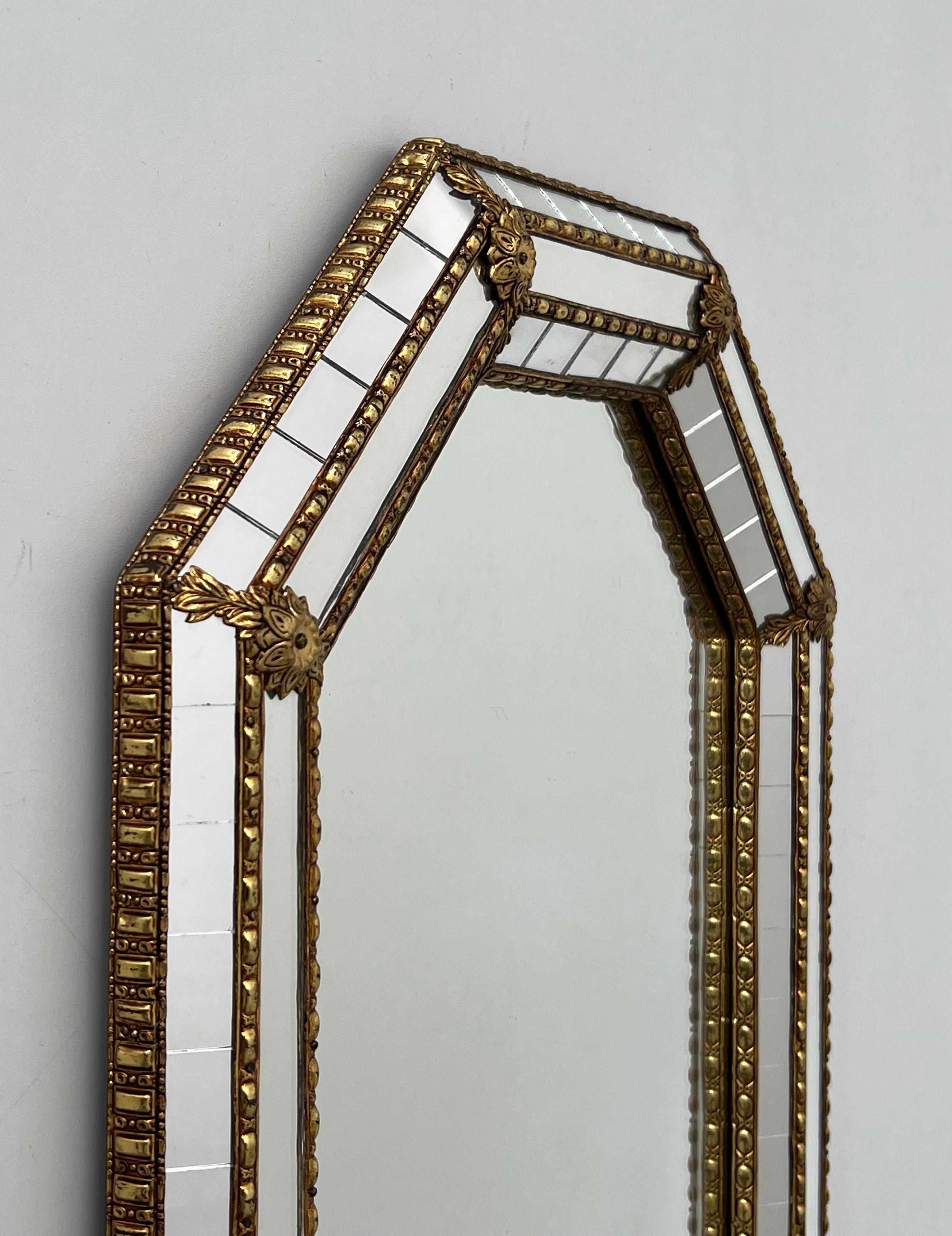 French Octogonal Multi-Facets Mirror with Brass Garlands For Sale