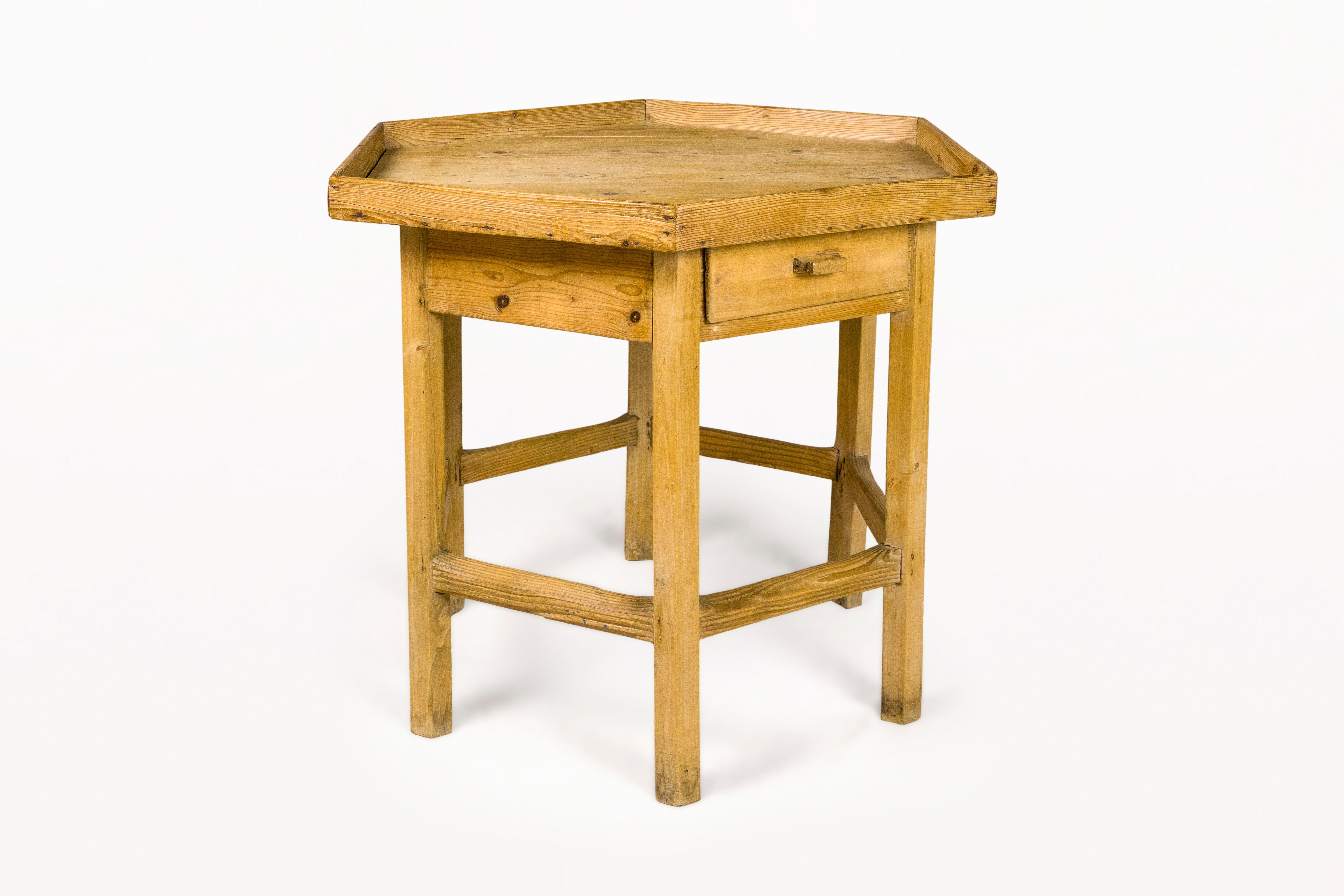 DESCRIPTION: Octogonal Rustic Side Table with drawer, 19th Century, Spain. Very decorative piece made with pine. 

CONDITION: Very good vintage condition. Wear consistent with age and use.

DIMENSIONS: Height: 73cm (28.74in) Width: 88cm (34.65in)