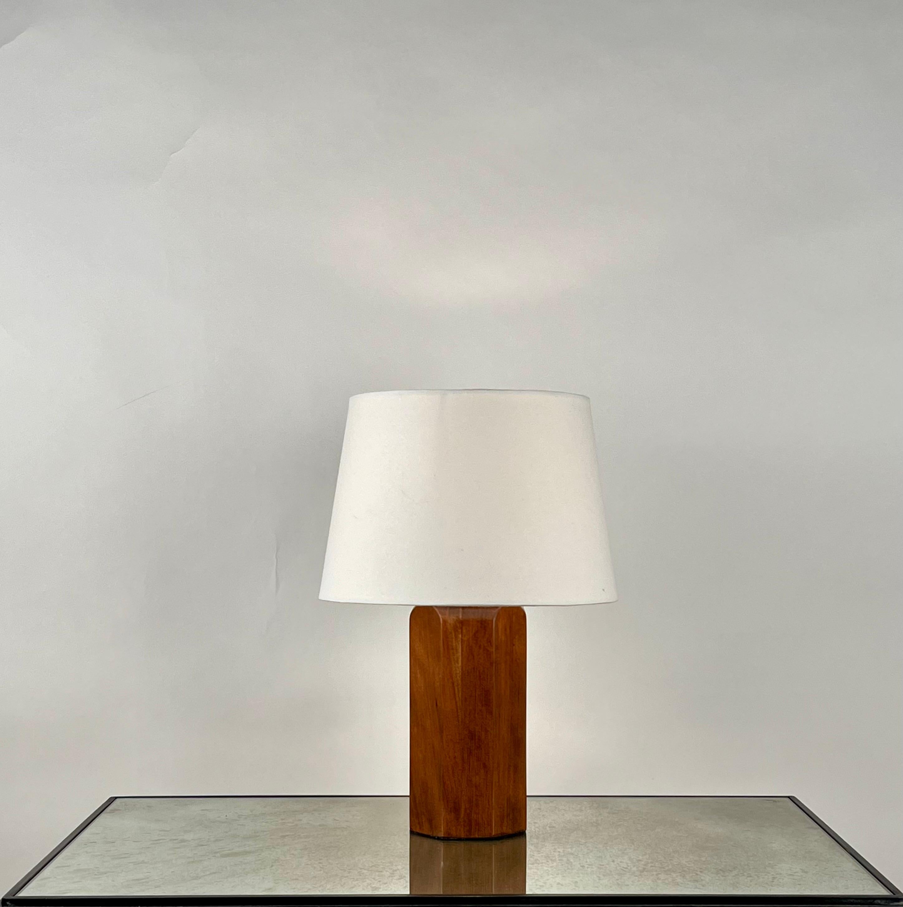 'Octogone' walnut table lamp with parchment shade by DESIGN FRÈRES®.

Attractive, understated combination of a polished walnut geometric base and European style parchment shade (no harp or finial).

Dimensions listed are with the shade on.

Wired