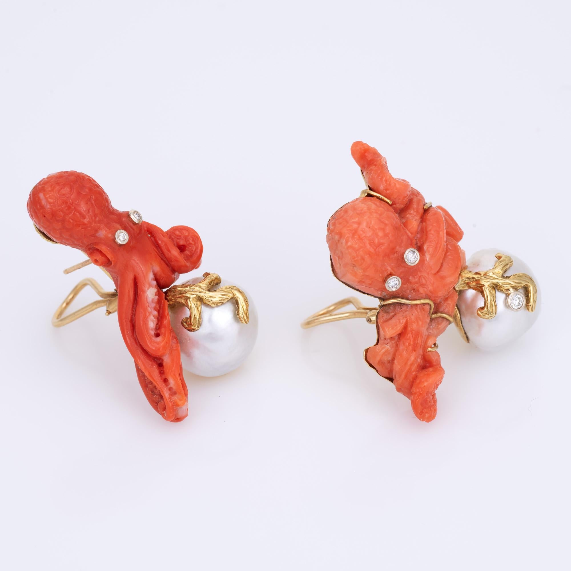 Distinct and unique carved coral, pearl & diamond Octopus earrings crafted in 18k yellow gold. 

Carved coral measures 1 1/4 x 1 1/4 and 1 1/2 x 1 inch. Baroque pearls each measure 16mm. Diamonds total an estimated 0.14 carats (estimated at H-I