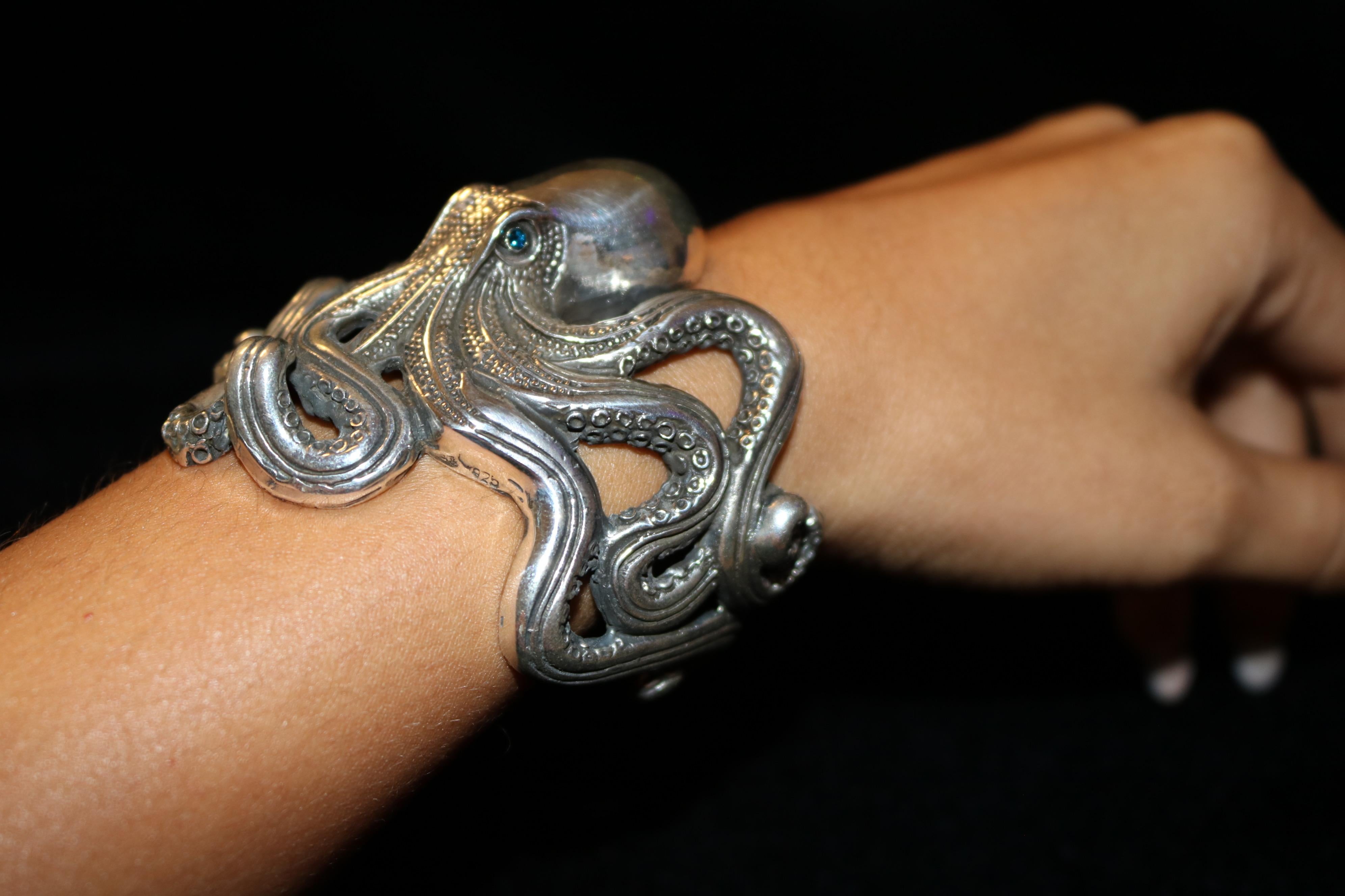 Beautiful statement piece, crafted in solid 925 sterling silver in the shape of an octopus. 
 This unique animal cuff  is perfect for a woman not afraid to steal glances where ever she goes.
This piece was meticulously designed to enhance the