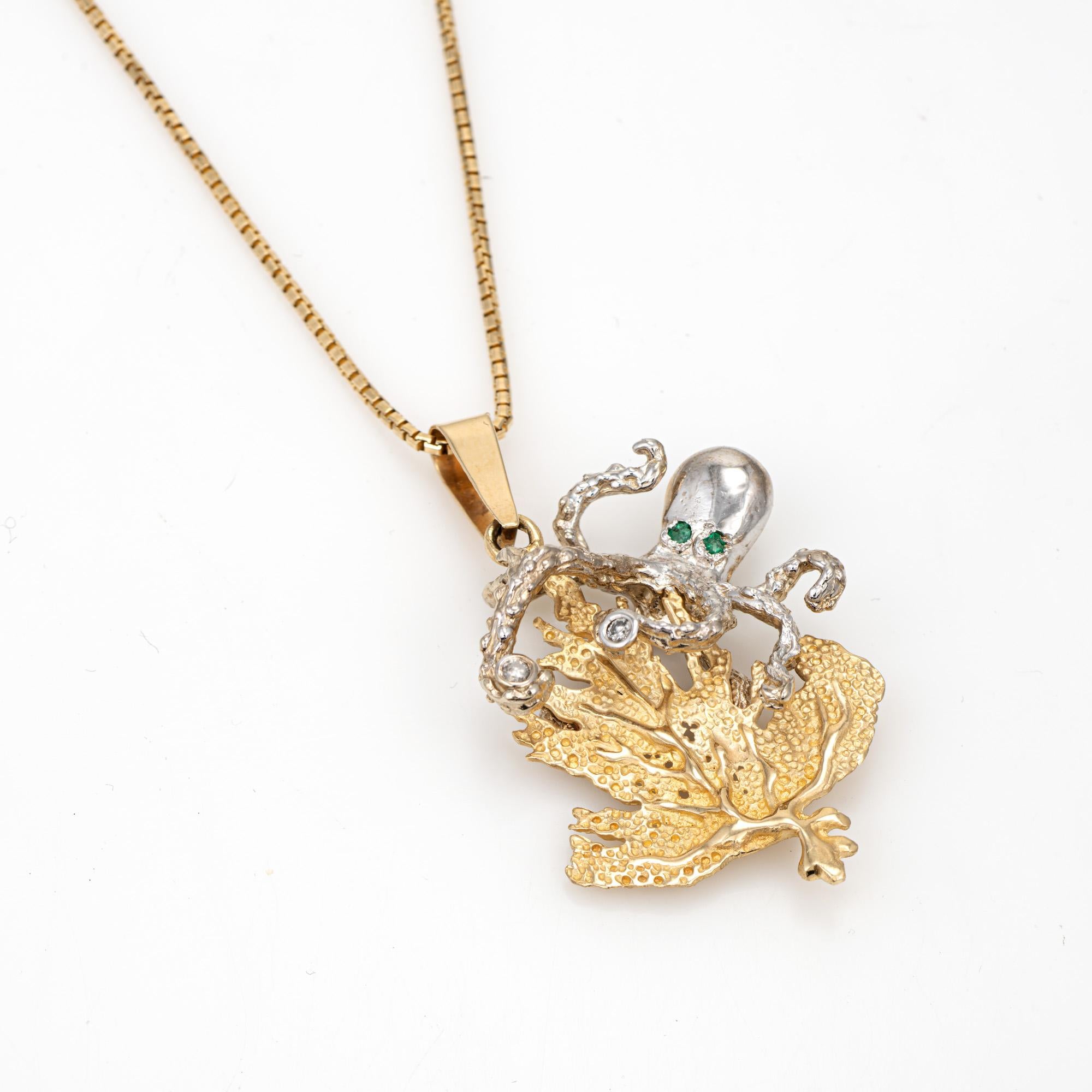 Distinct & beautifully detailed Octopus necklace crafted in 14 karat yellow & white gold. 

Two small emeralds total an estimated 0.02 carats. Two diamonds total an estimated 0.02 carats.   

The elaborate Octopus is a unique conversation starter!