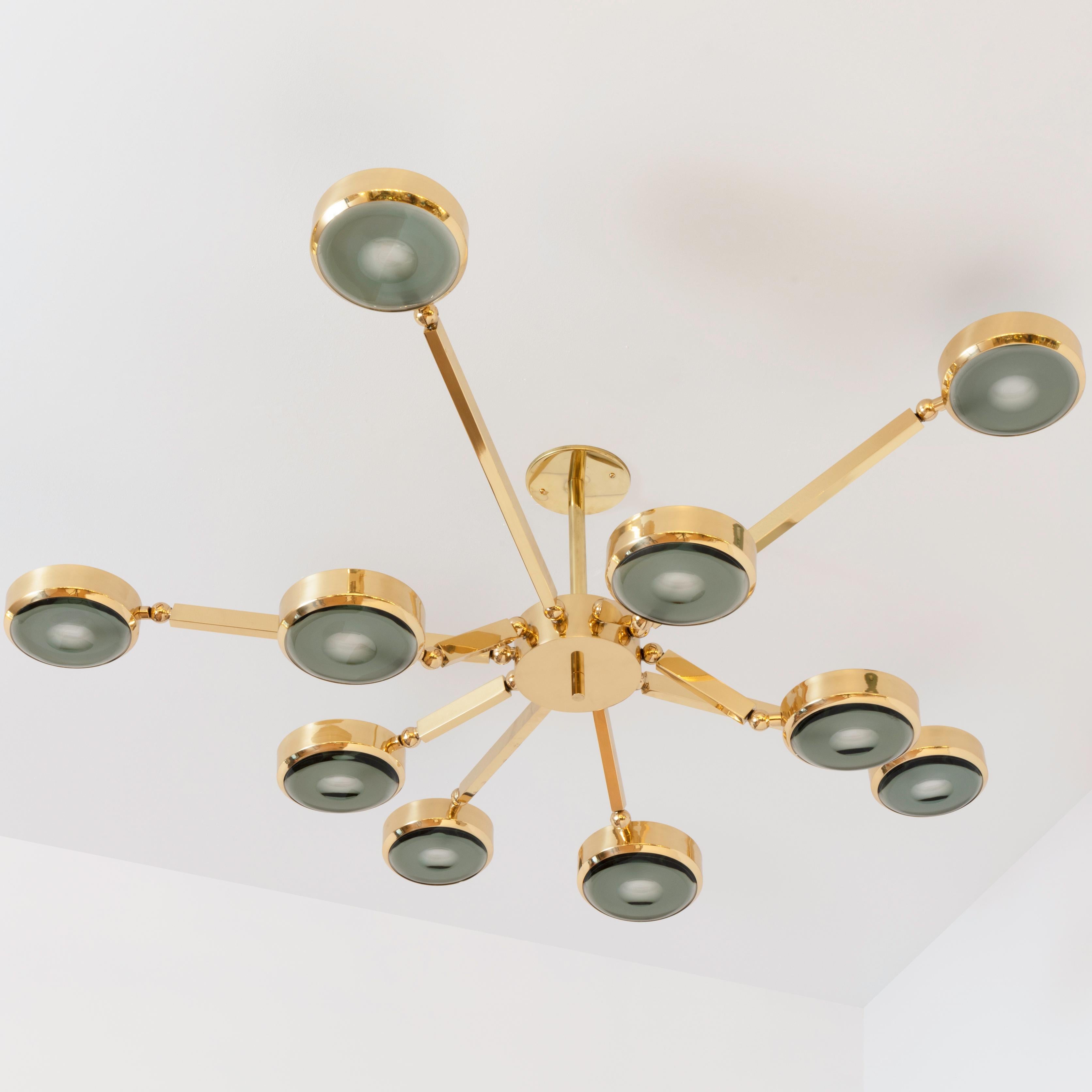 Oculus Articulating Ceiling Light- Polished Brass Finish and Carved Glass In New Condition For Sale In New York, NY