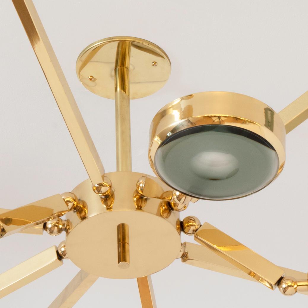 Contemporary Oculus Articulating Ceiling Light- Polished Brass Finish and Carved Glass For Sale