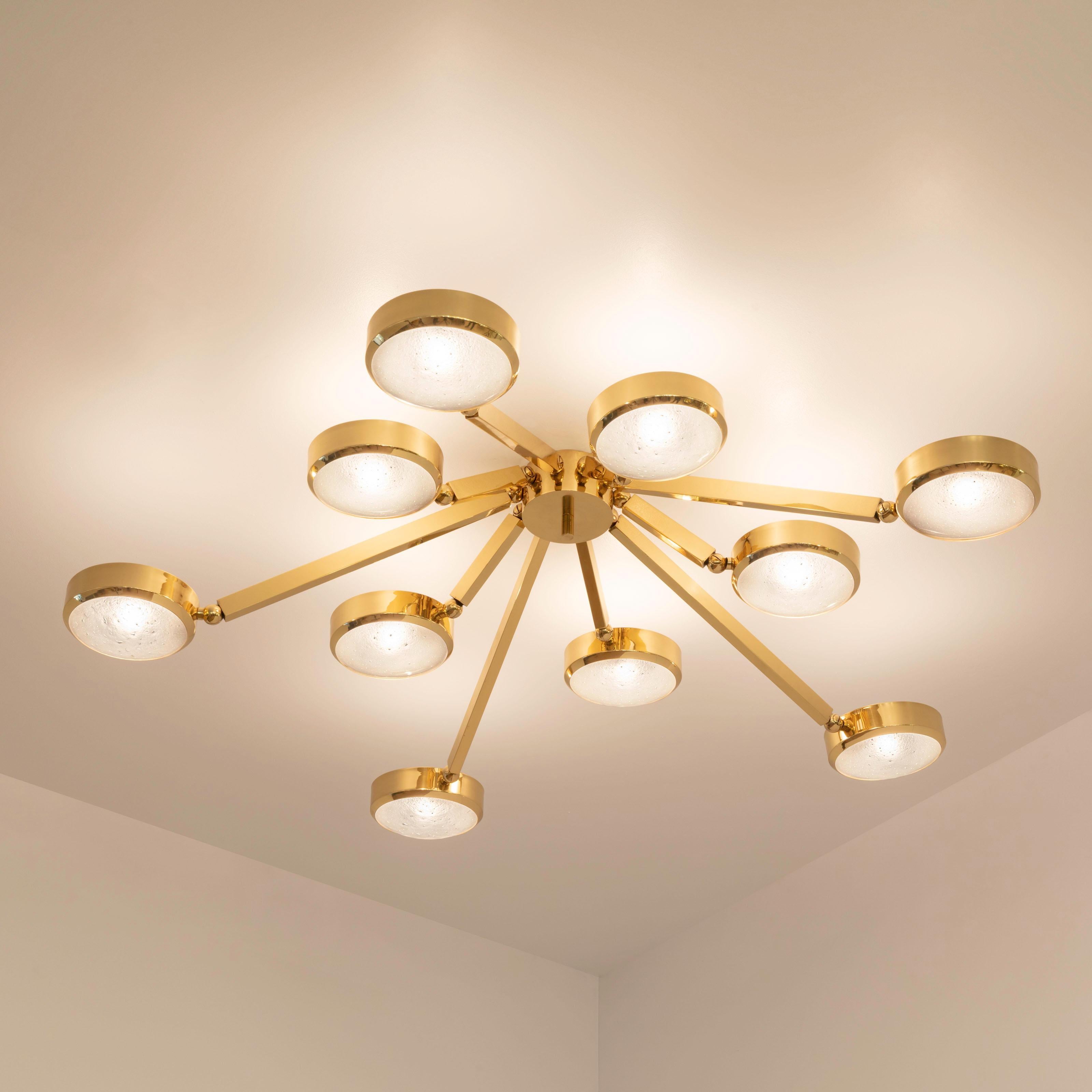 The Oculus ceiling light features an innovative articulating design that allows the ten arms to have a wide range of motion for endless configurations. The brass constructed frame can be flush mounted or installed on a stem.
The first images show