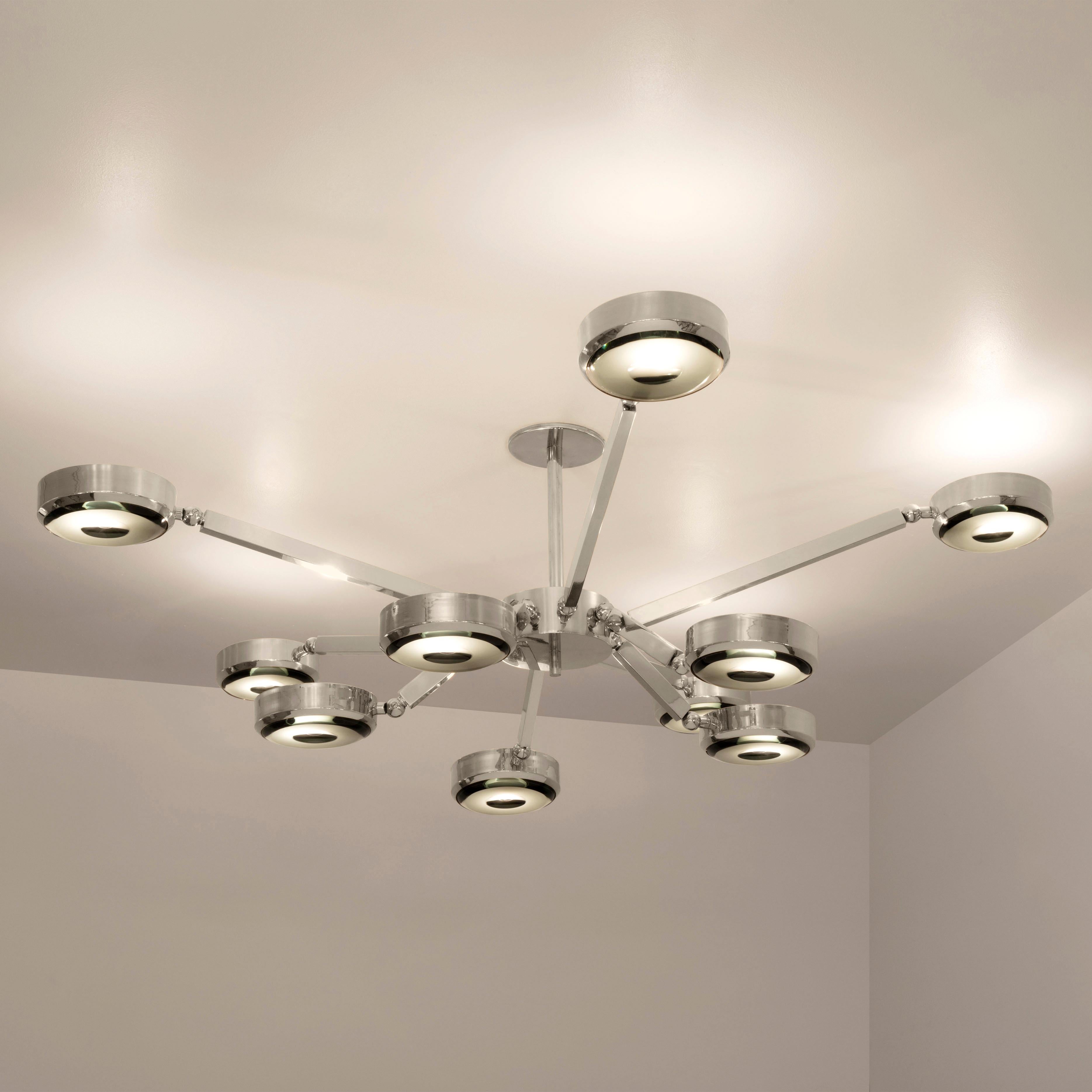 The Oculus ceiling light features an innovative articulating design that allows the ten arms to have a wide range of motion for endless configurations. The brass constructed frame can be flush mounted or installed on a stem and is fitted with our