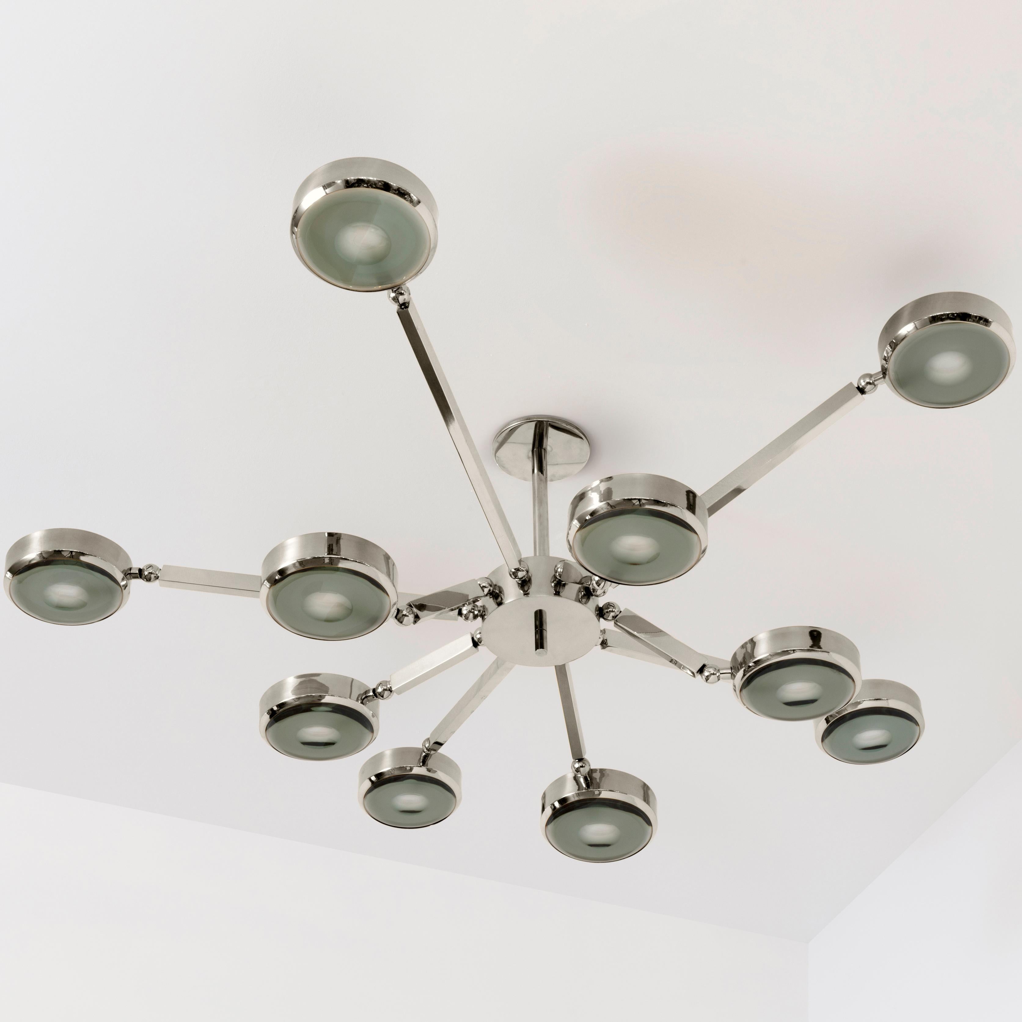 Modern Oculus Articulating Ceiling Light-Polished Nickel Finish and Carved Glass For Sale