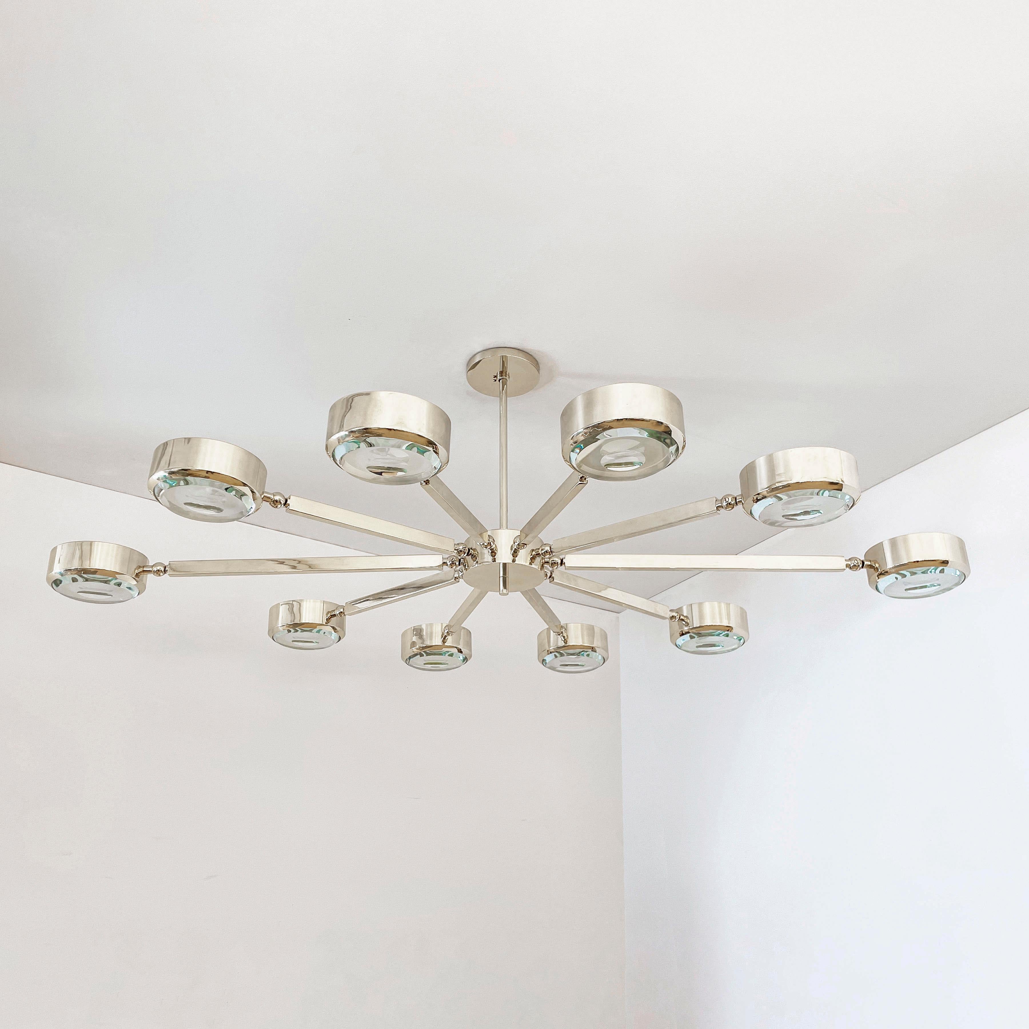 The Oculus ceiling light features an innovative articulating design that allows the ten arms to have a wide range of motion for endless configurations. The brass constructed frame can be flush mounted or installed on a stem and can be fitted with
