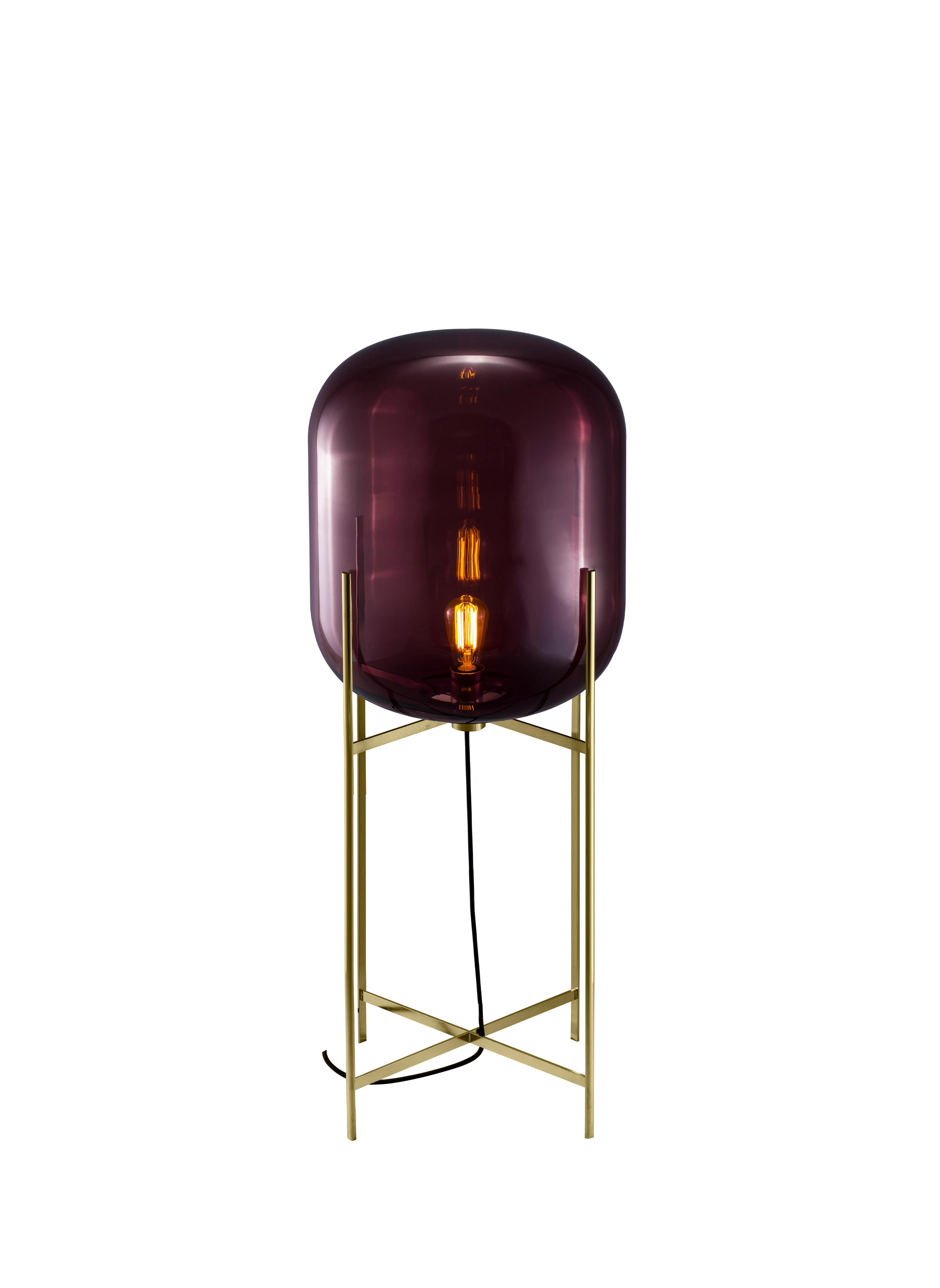 Oda in between Aubergine brass floor lamp by Pulpo
Dimensions: D45 x H111.2 cm
Materials: handblown glass coloured and steel.

Also available in different finishes.  

A slender base hugs a bulbous form. An industrial motif softened by the