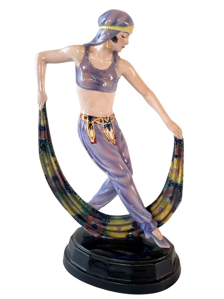 “Odaliske”by Josef Lorenzl (1892-1950) for Goldscheider 

Beautiful oriental belly dancer with long moon shaped veil and headscarf. 
Very detailed glazed ceramic sculpture 
Great condition: no chips, no restorations 

Original Art Deco, Vienna