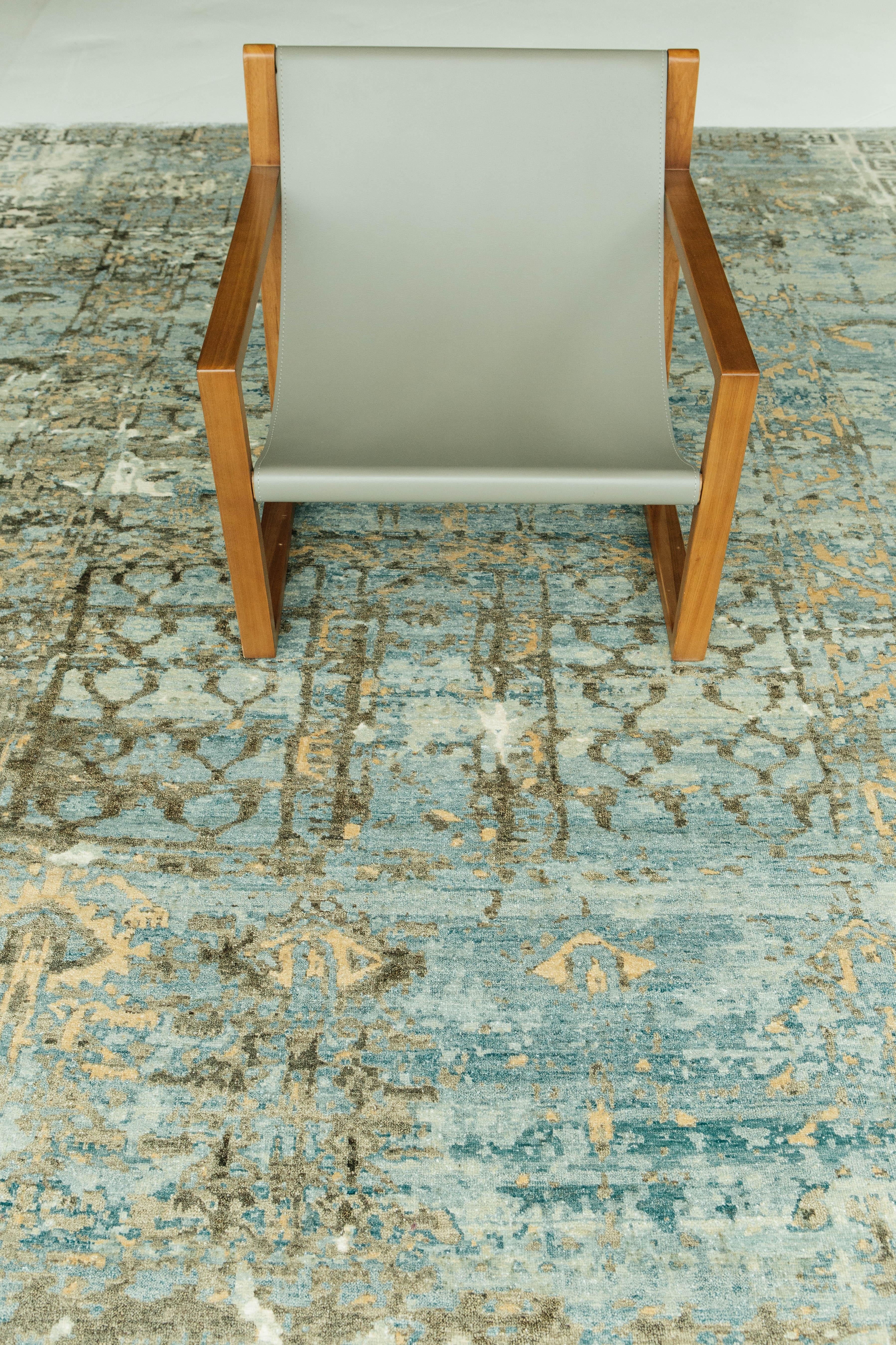 Much like a precious stone, 'Odara' has the powers to stimulate and soothe. This natural pure silk pile weave is bordered with soft imagery and shining colors of turquoise, pale gold, and charcoal.

Rug Number 25858
Size 9' 0