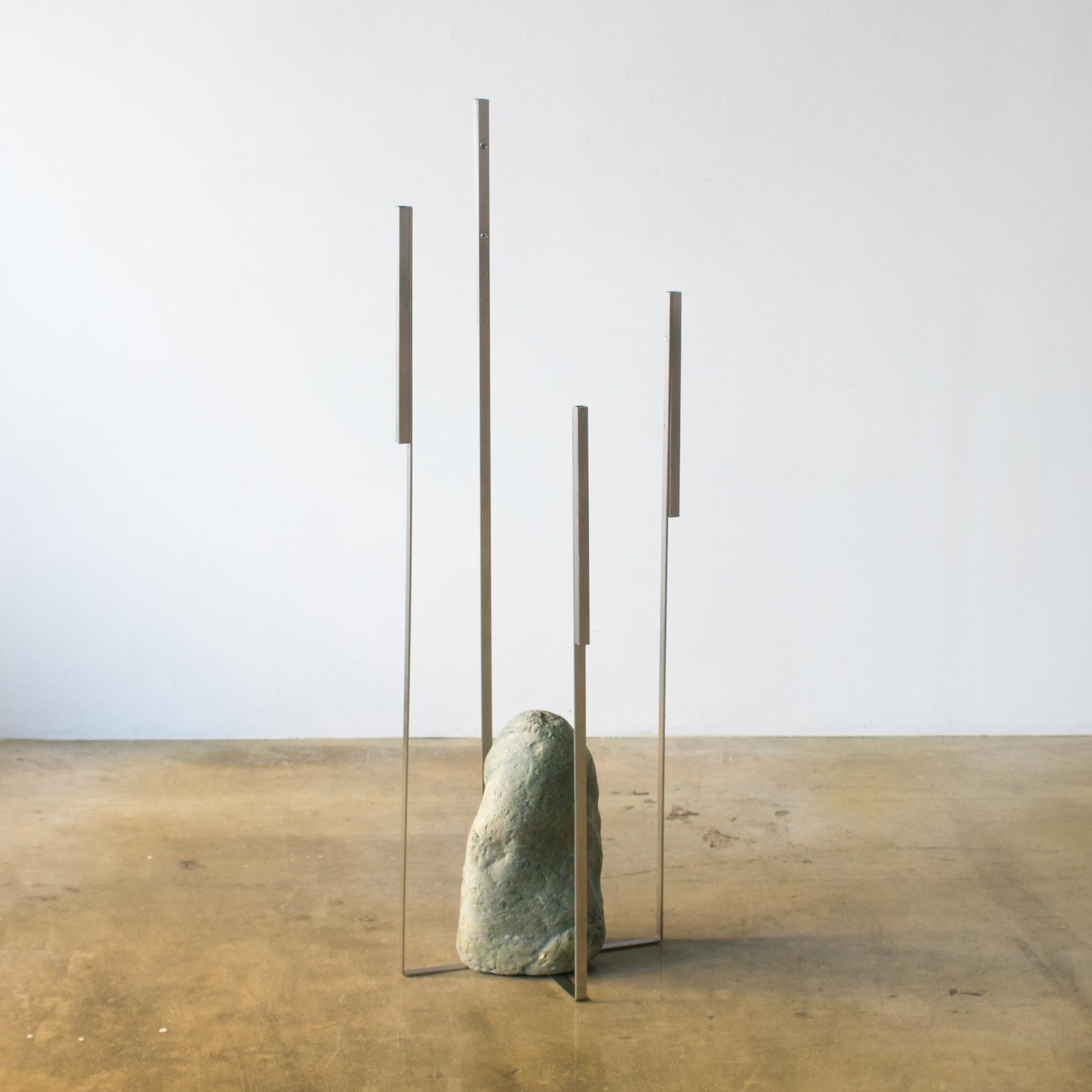 Sculpture or sculptural vase for dried flowers designed by Batten and Kamp.
Minimal structure furniture made of stainless steel and natural stone.
 