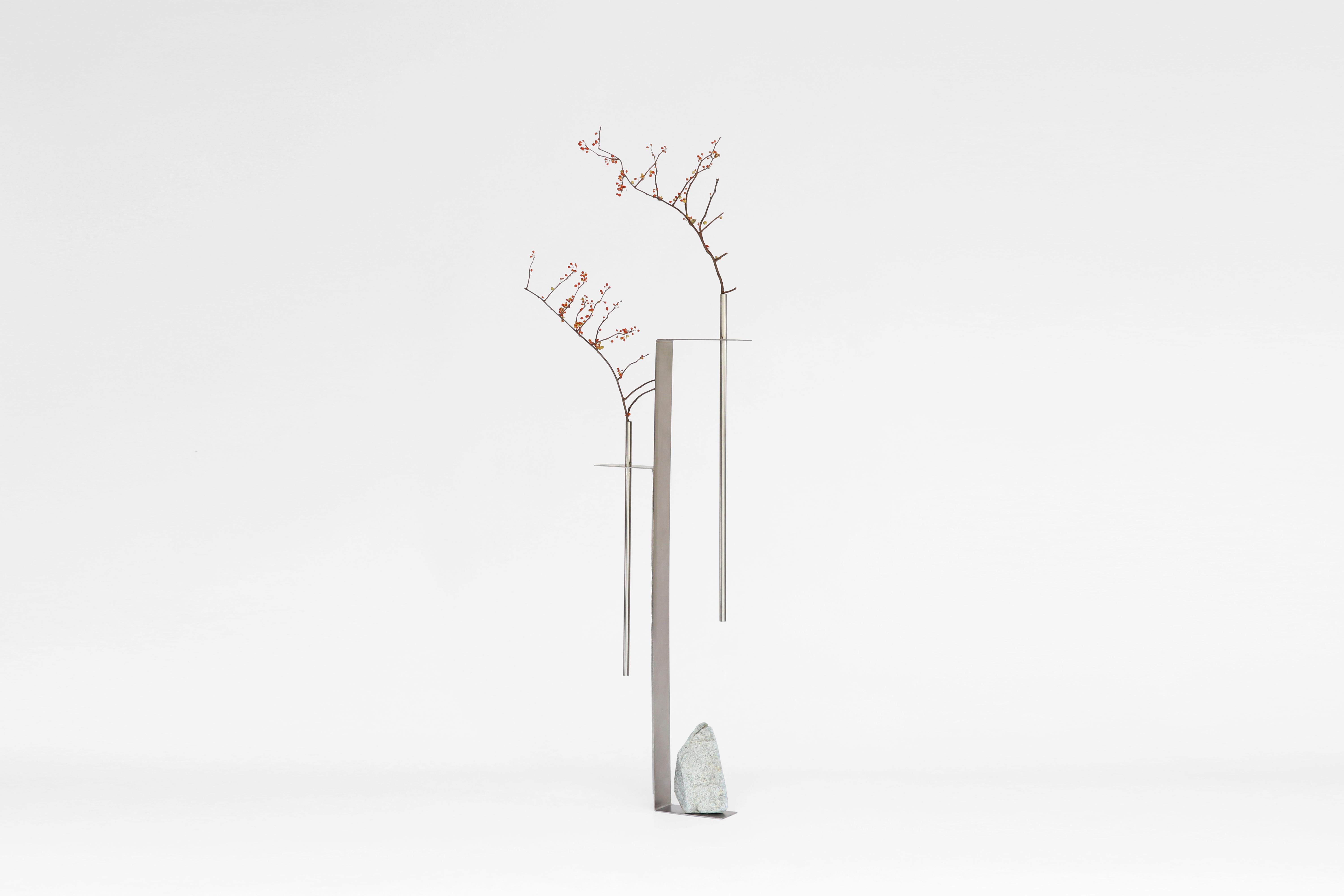 Odd balance 03 by Batten and Kamp
2020
Shelter to Ground Collection
Signed
Limitied Edition 8 + 2 AP
Dimensions: Approximate W 37 x D 10 x H 120 cm
Materials: Hand stainless steel, natural stone
 
The stone is different with each piece and