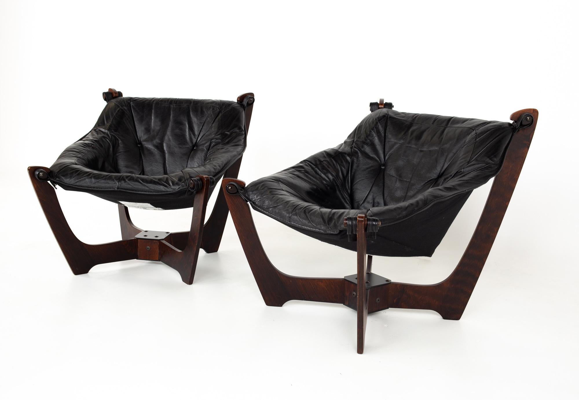 Odd Knutsen mid century Luna leather lounge chairs - pair
Each chair measures: 29 wide x 33 deep x 29 high, with a seat height of 17 inches

All pieces of furniture can be had in what we call restored vintage condition. That means the piece is