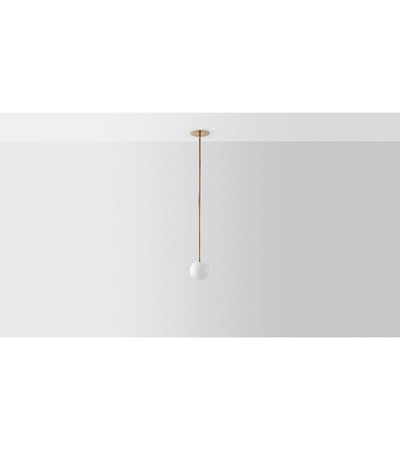 Single arc oddments chandelier by Volker Haug
Dimensions: Diameter 15 x height 40 cm 
Material: Brass. 
Finish: Polished, aged, brushed, bronzed, blackened, or plated
Cord: Black Fabric
Light: : : G9 - LED or Halogen 240V x 1
Glass Bulb: 150mm