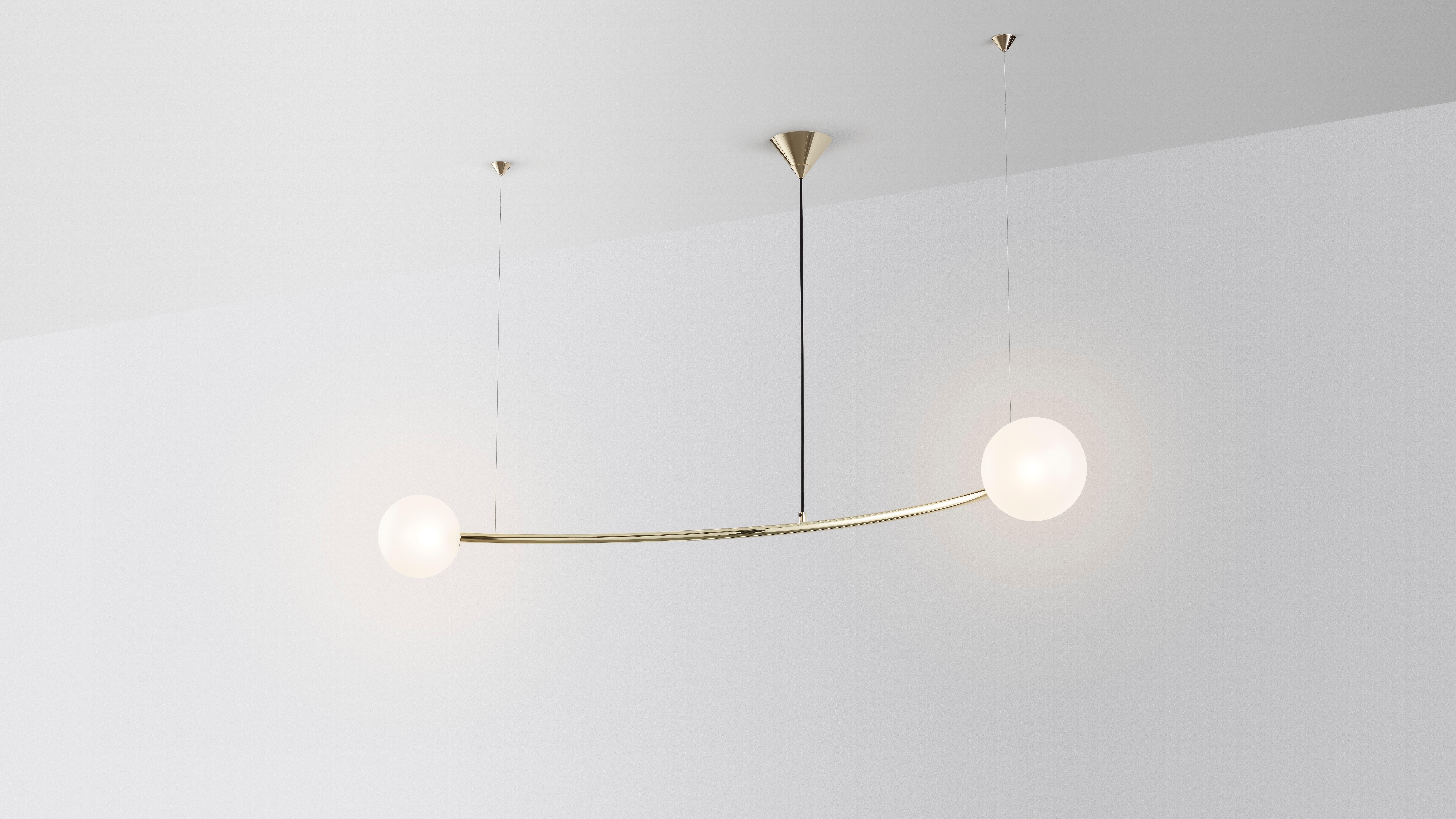Oddments by Volker Haug 
Dimensions: W 95, D 160, H 40 cm
Materials: Polished or bronzed brass
Finish: Raw, satin lacquer or enamel
Cord / Cable: Black fabric / stainless steel
Suspension: minimum 40 cm

Lamp: G9 - LED or Halogen 240V (120V