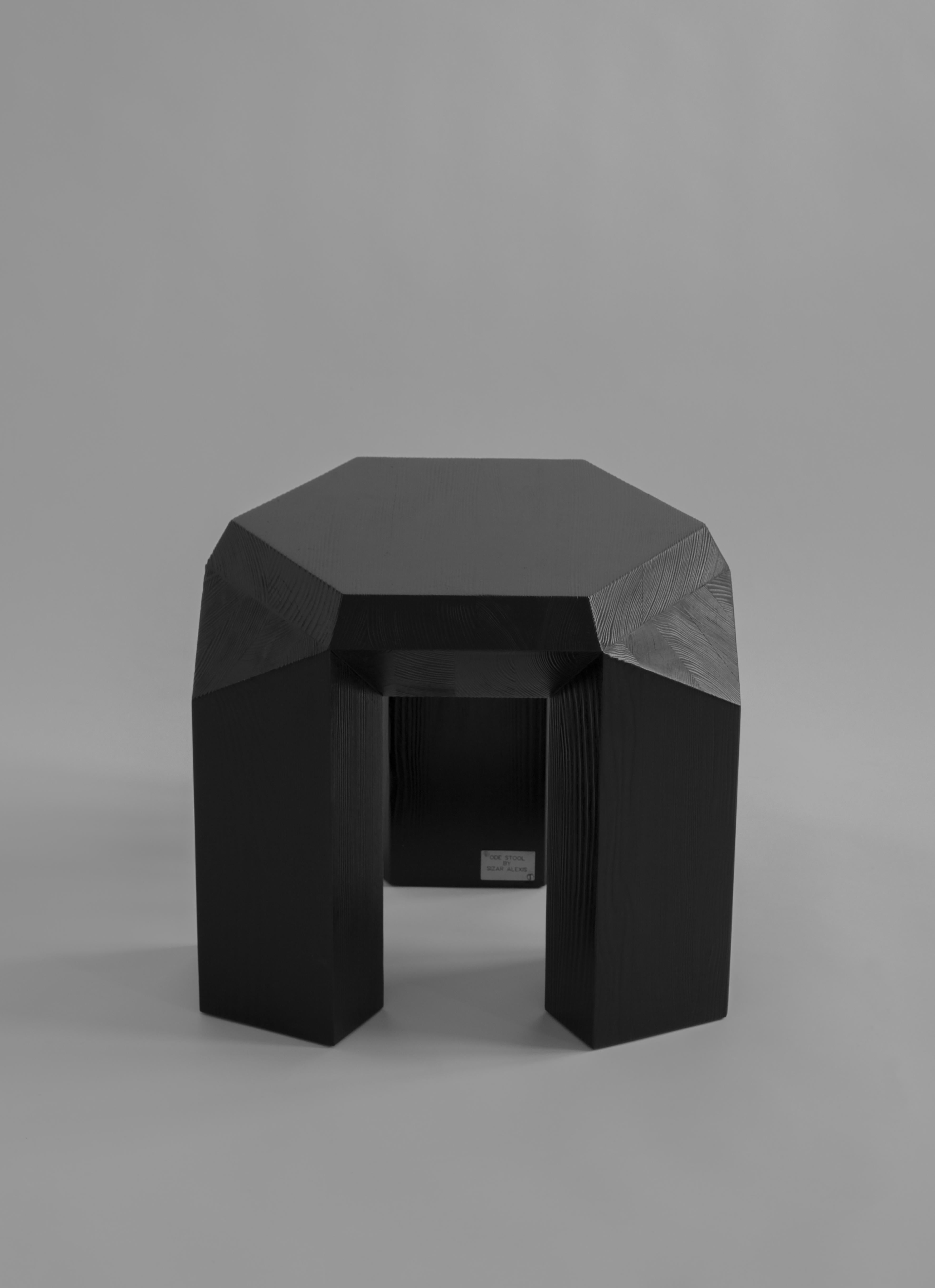 Ode three-legged stool by Sizar Alexis
Signed and numbered
Edition of 12
Dimensions: Length 45 x width 45 x height 40 cm
Materials: Burned pine wood

The hexagon has more to it than we think, and some of the aspects of this shape are