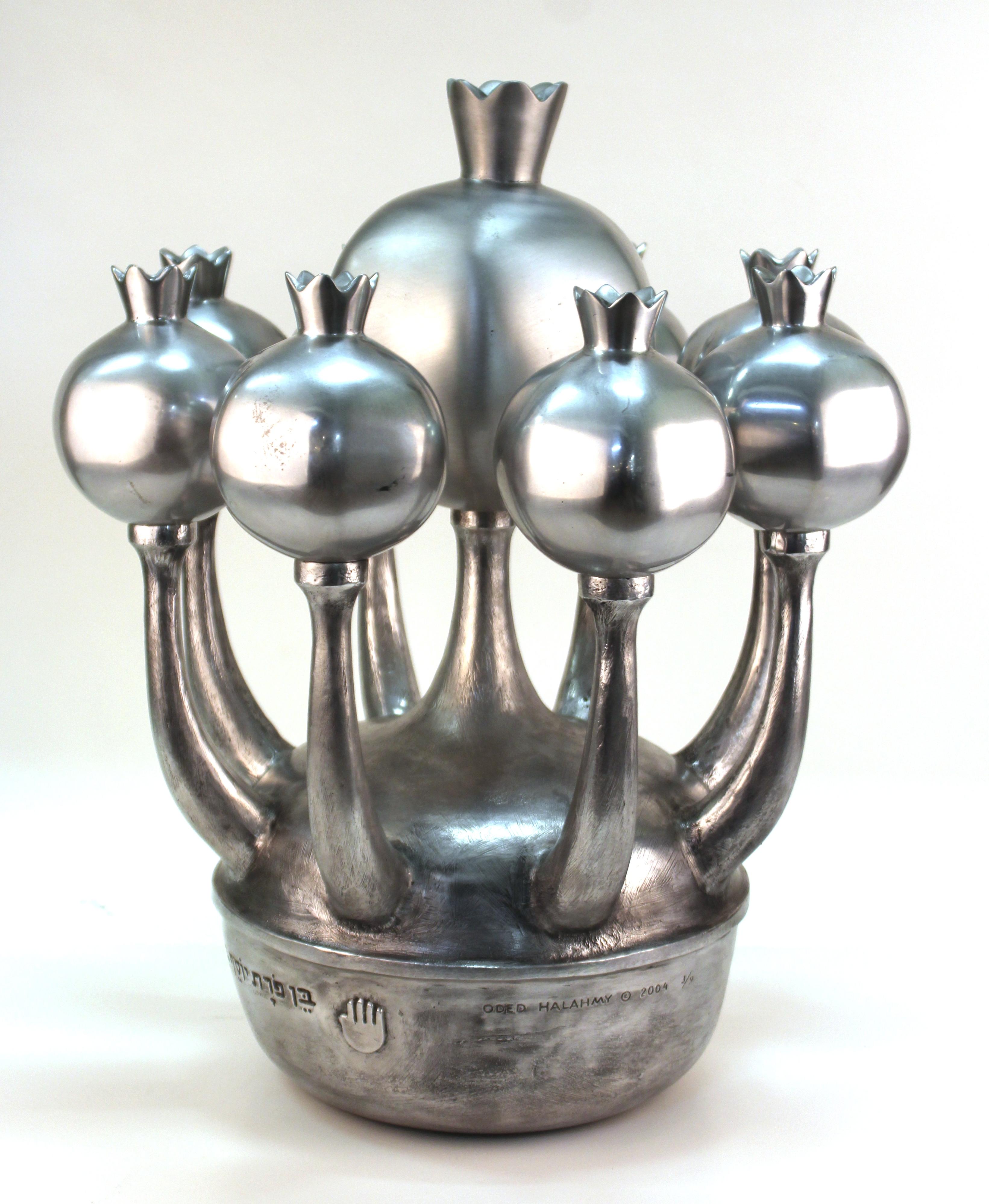 Modern cast aluminium menorah by Oded Halahmy, titled 'Baghdad Lights For Peace', created in 2004. Marked by the artist and dated on the side, from an edition of nine. In great vintage condition.