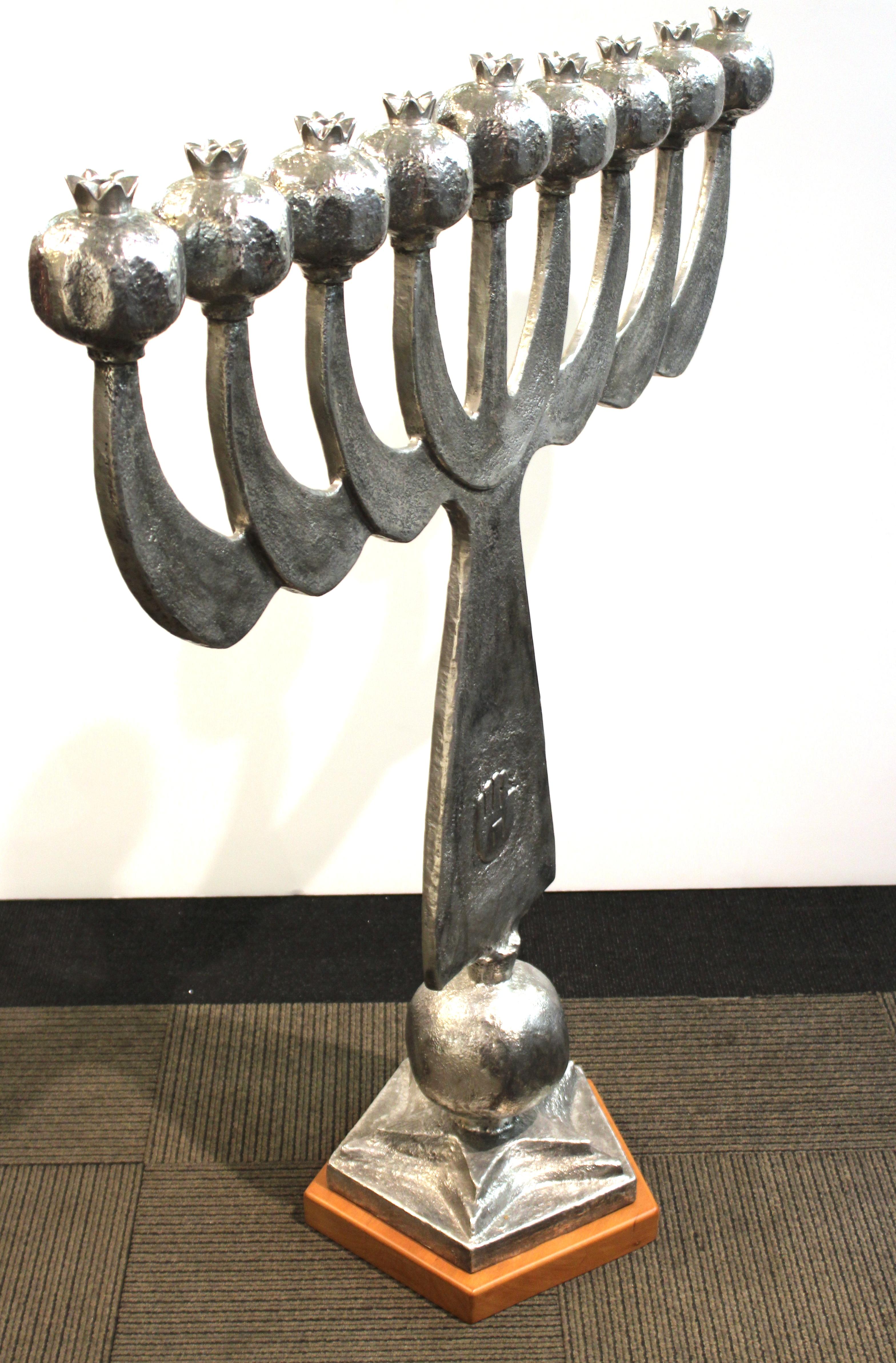 Modern cast aluminium menorah by Oded Halahmy, titled 'Light For Morocco', created in 2011. Marked by the artist and dated on the side. In great vintage condition.