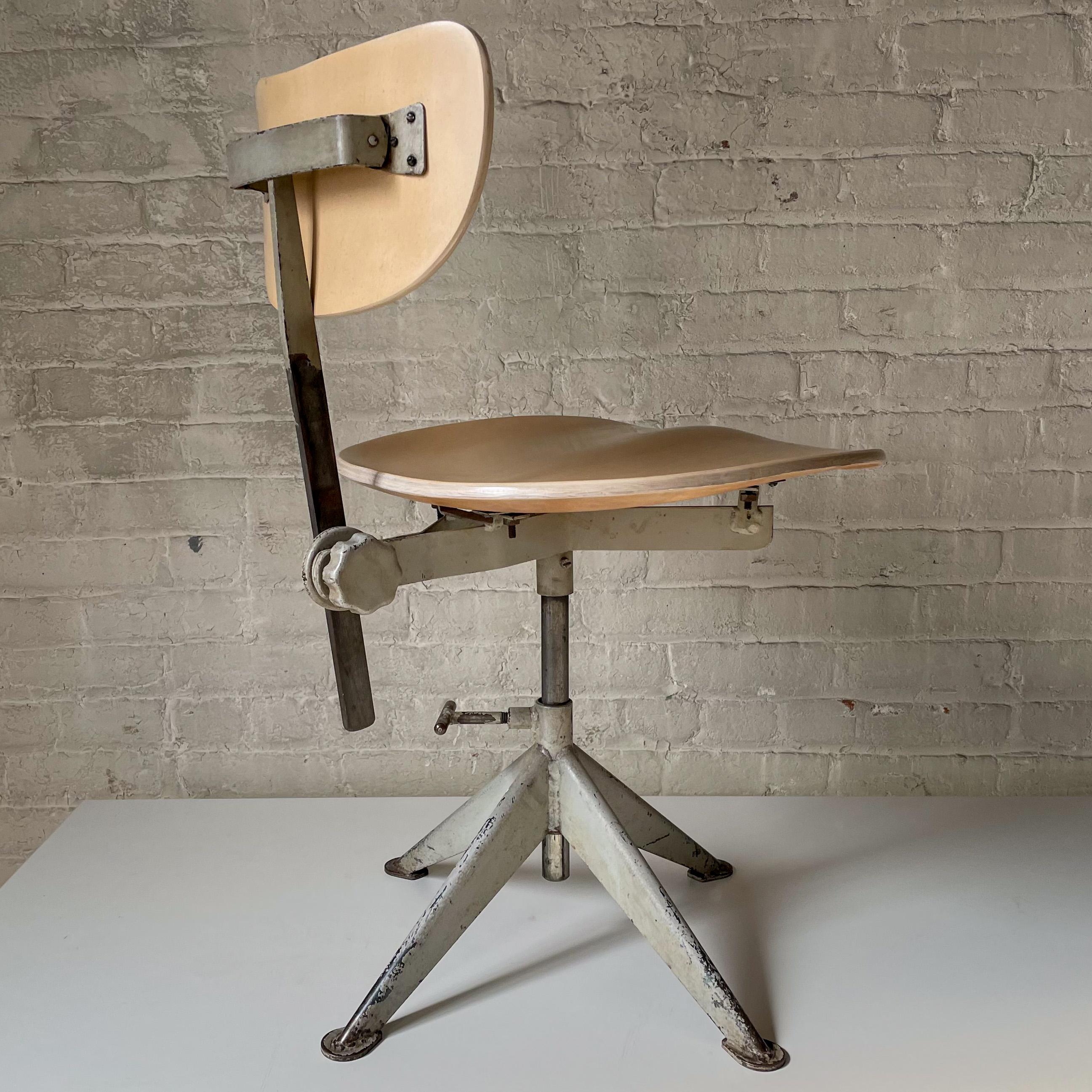 Work chair of molded birch plywood and painted steel by the Swedish metalworking firm of Odelberg Olsen, produced circa 1948, for distribution by Knoll in the U.S. market. The chair, which references Prouve, is shown in the 1948 Knoll catalog (image