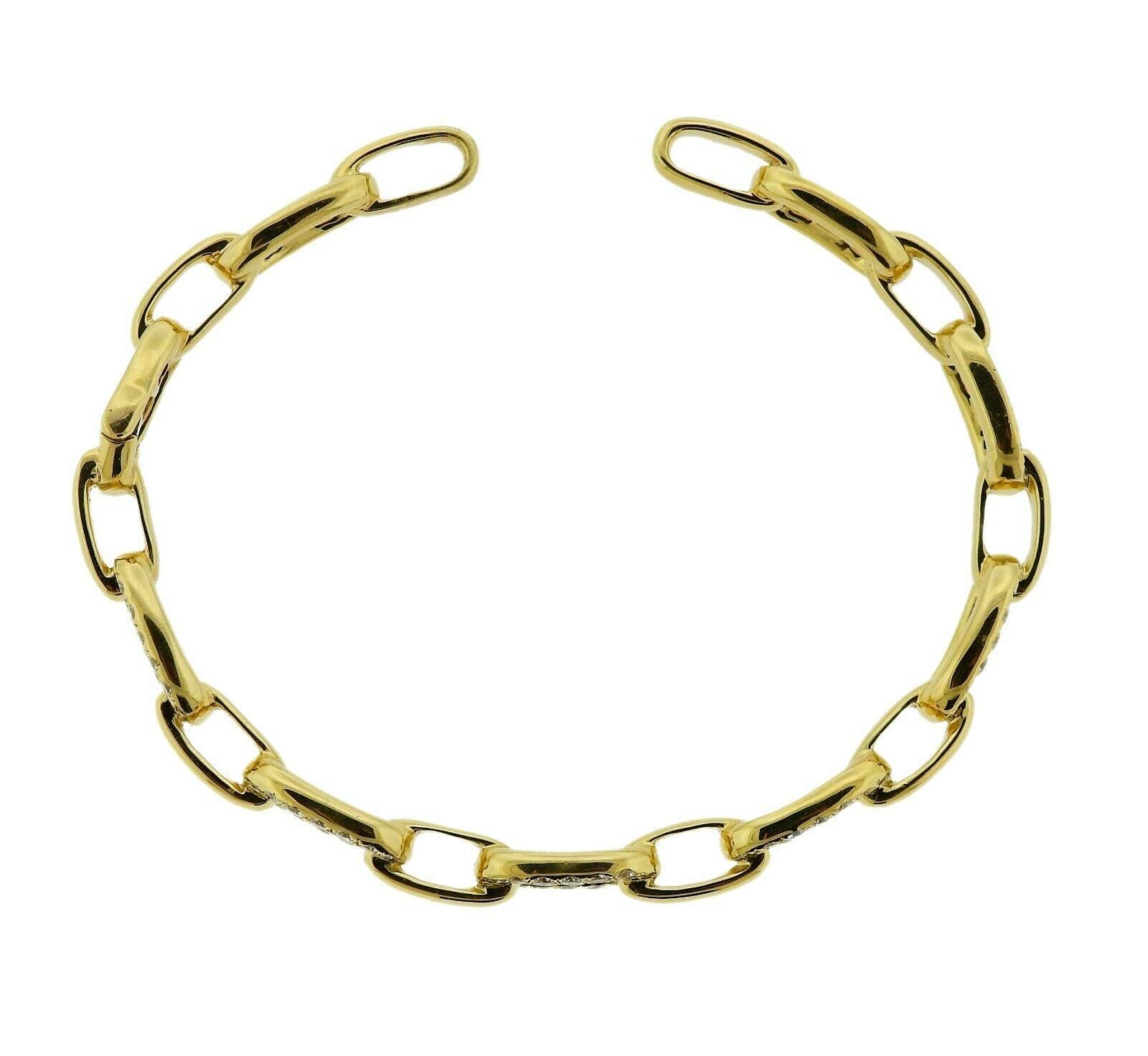 18k yellow gold bracelet featuring approximately 1.97ctw of G/VS diamonds. Retail is $10,200. Bracelet will fit approx. 7