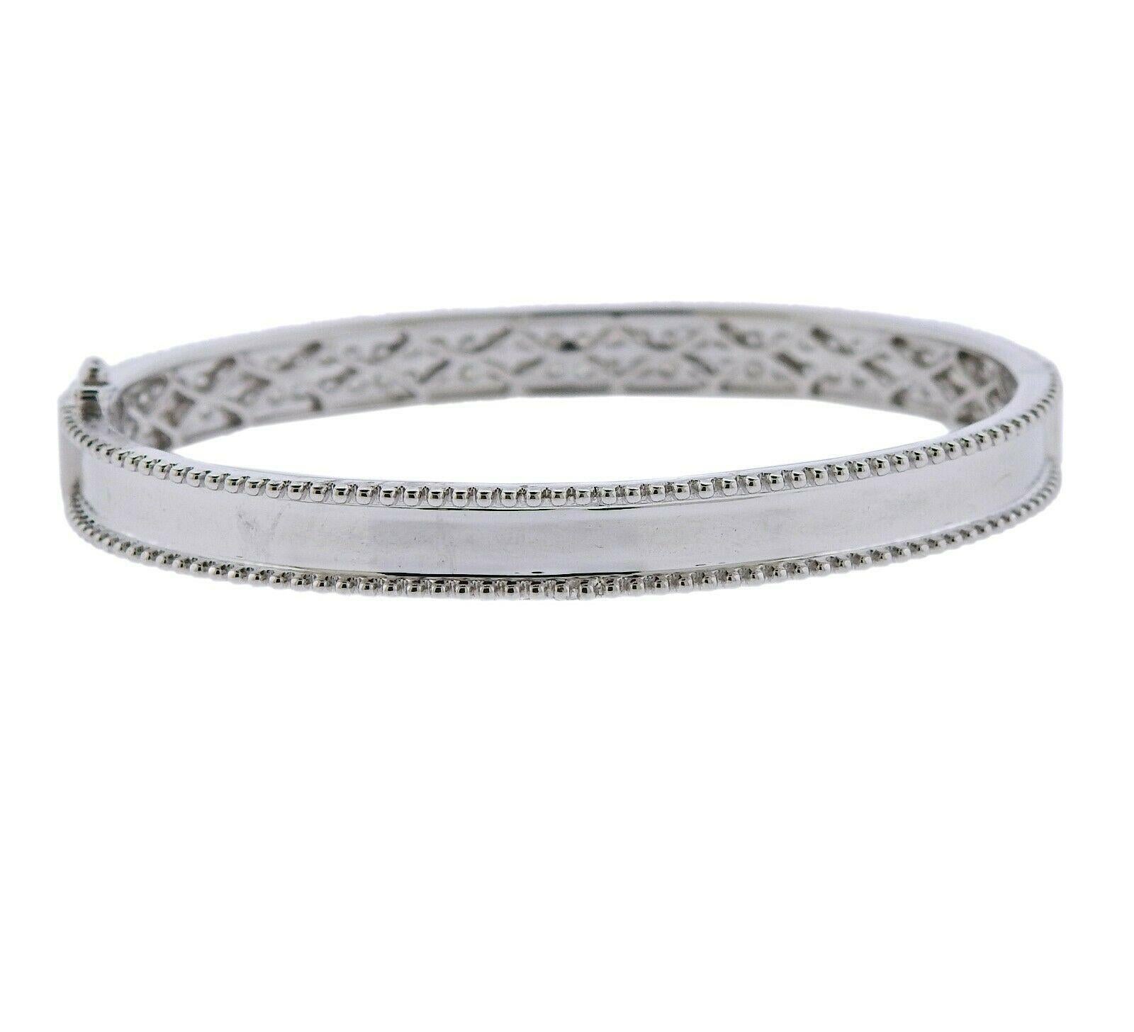 18k white gold bracelet featuring approximately 2.24ctw of G/VS diamonds. Retail is $11,200. Bracelet will fit approx. 7
