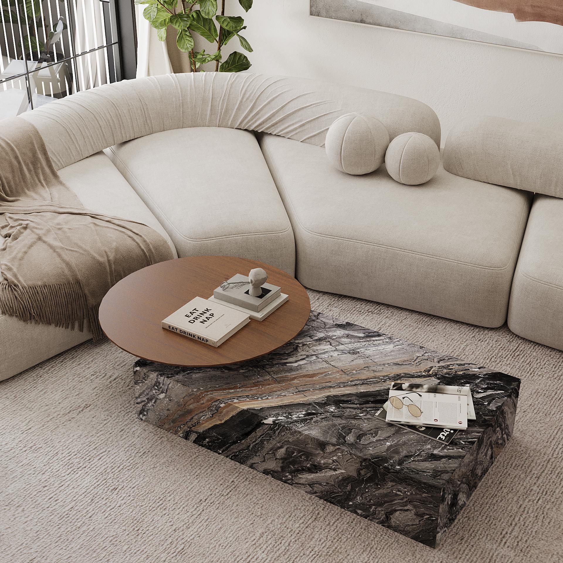 Une table basse moderne et élégante avec une base luxueuse en marbre et un plateau rond lisse et allongé. Naturelle pour ajouter une touche de sophistication à votre espace de vie, cette pièce combine le marbre naturel avec le bois résultant en un