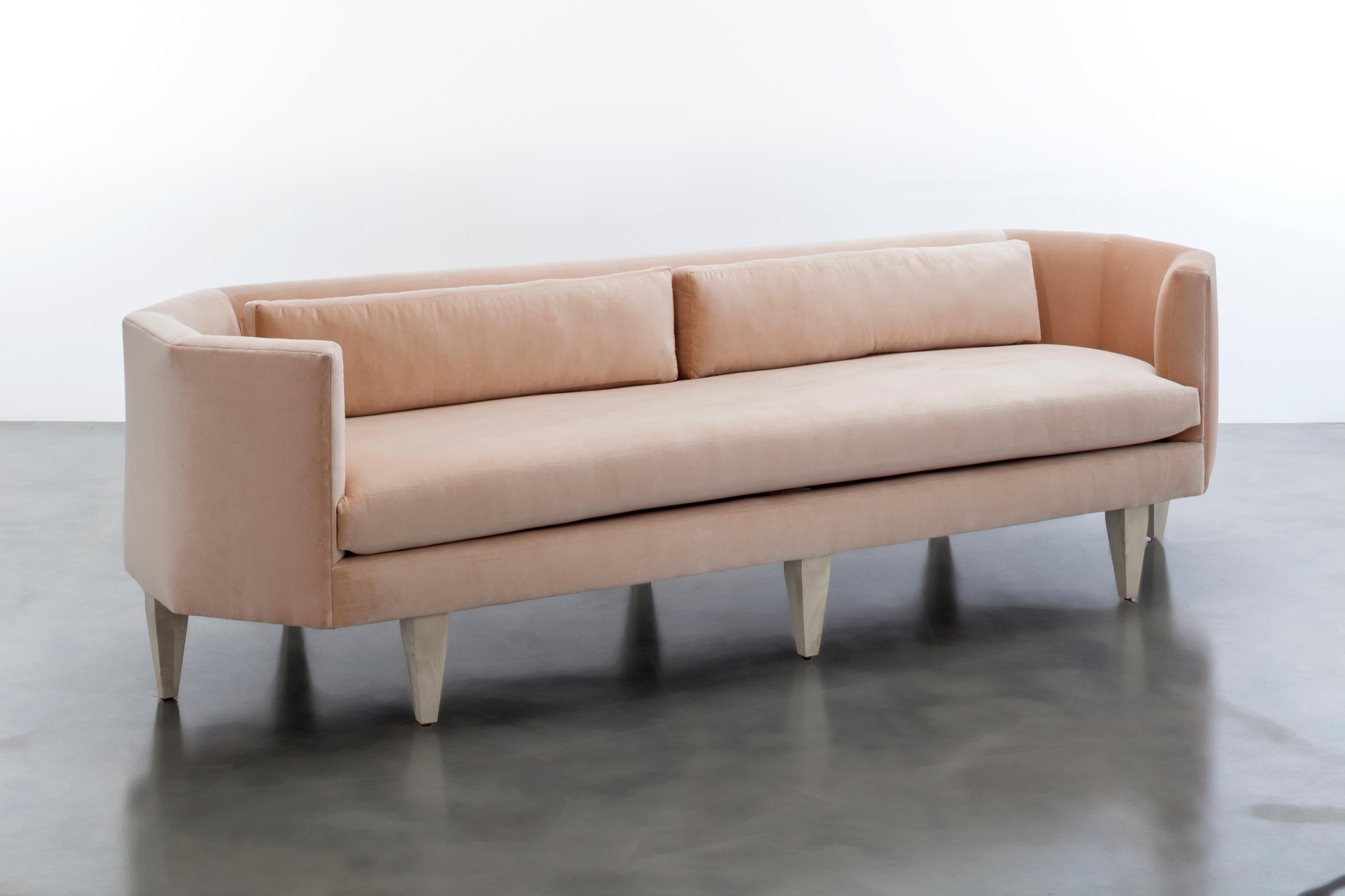 ODETTE SOFA - Modern Octagonal Sofa in Pale Grey Glam Velvet 

The Odette Sofa is a modern and stylish piece of furniture that combines comfort and elegance in a unique and beautiful way. This sofa features an octagonal-shaped upholstered velvet