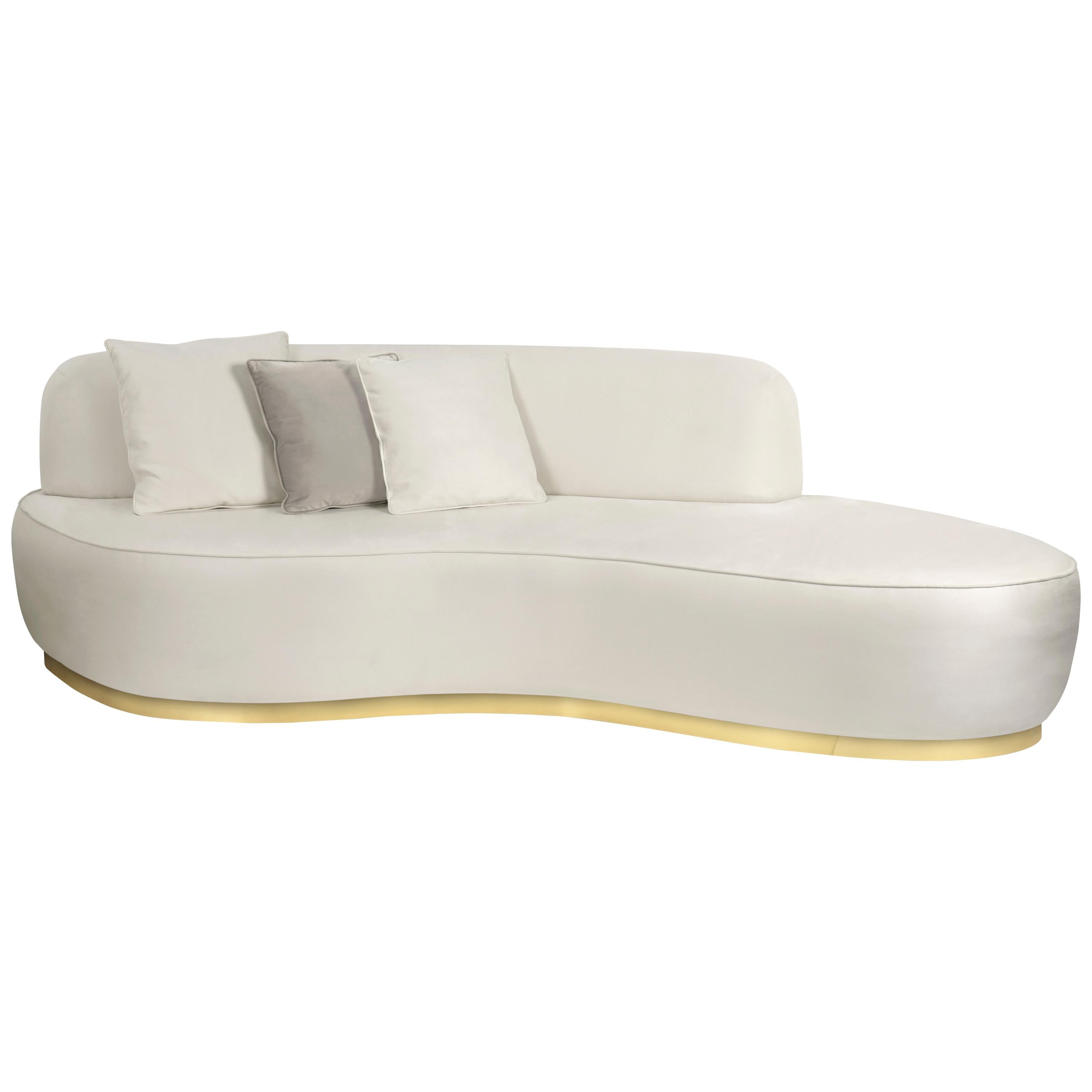 Inspired by the Swan Lake Op. 20, ballet composed by Pyotr Ilyich Tchaikovsky, Odette Modern Sofa tells the story of a princess turned into a swan by an evil sorcerer's curse. Its sweeping silhouette is accentuated with a polished brass structure