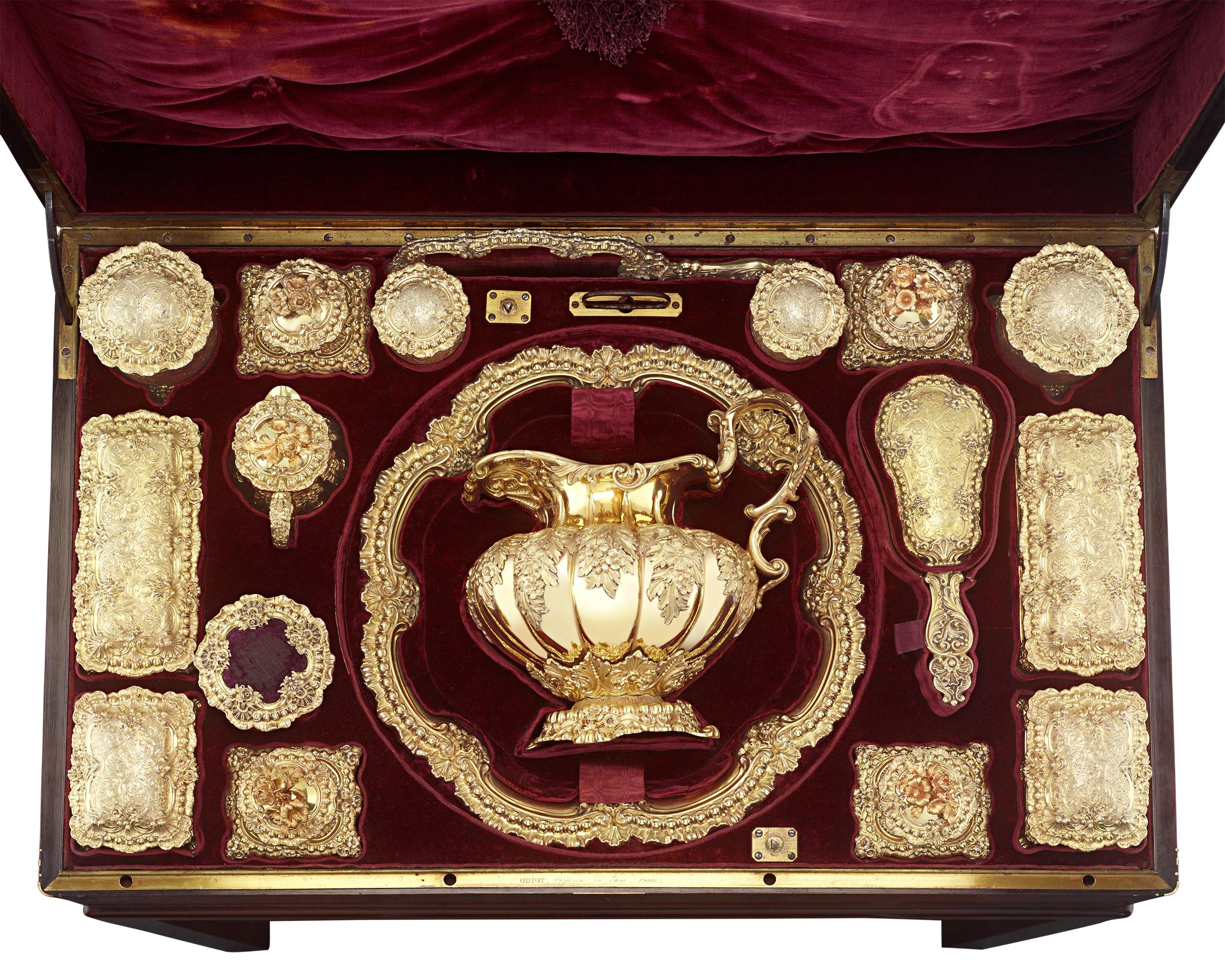 French Empire Silver-Gilt Traveling Dressing Case
Jean-Baptiste-Claude Odiot
Circa 1835

This exceptional silver-gilt nécessaire de voyage represents the pinnacle of French silversmithing from the early 19th century. Crafted by Jean-Baptiste-Claude