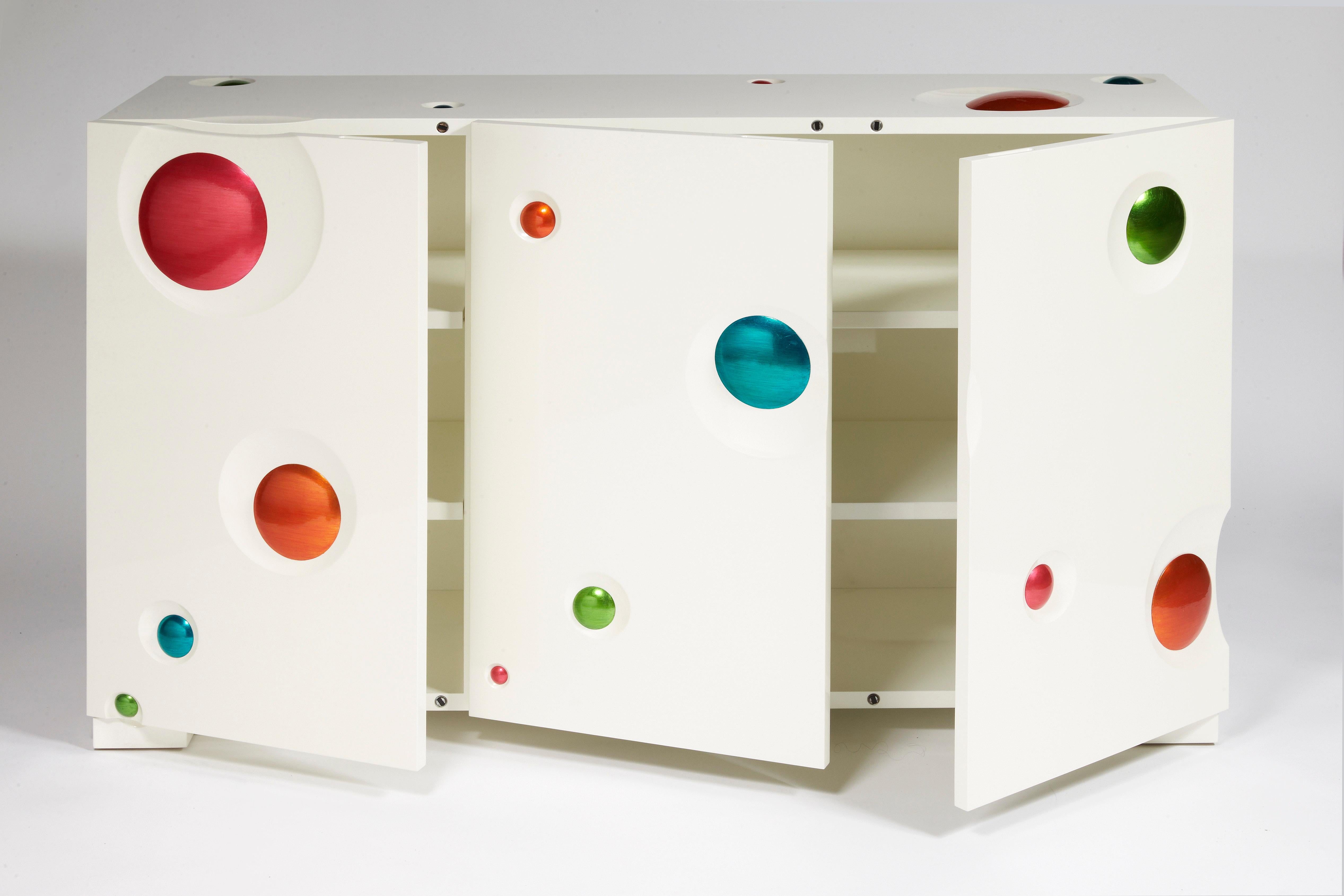 Sideboard.
Cat-Berro Edition 2011
Three doors. 
Pearly enameled wood. Colored varnished aluminium leaves.
Dimensions: L 60’’, H 35.5’’, D 18’’.
L 150 cm, H 90 cm, P 45 cm.
LAST PIECE OF THE EDITION

Signed piece of a limited edition of 8 + 2