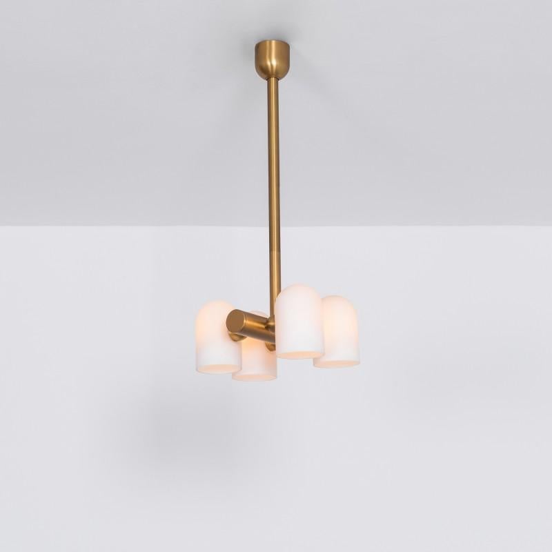 Brass 4 opal bulb chandelier by Schwung
Dimensions: D 31.4 x W 27.3 x H 117.4 cm
Materials: Solid brass, triplex opal glass. 
Finish: Natural brass. 
Available in finishes: Polished nickel or black gunmetal.
All our lamps can be wired according