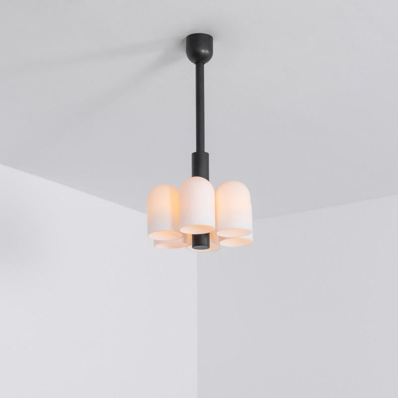 Black 6 pendant light by Schwung
Dimensions: 31.5 x H 59.7 cm
Materials: Black gunmetal, frosted glass

Finishes available: Black gunmetal, polished nickel, brass
4 other sizes available

Schwung is a German word, and loosely defined, means energy