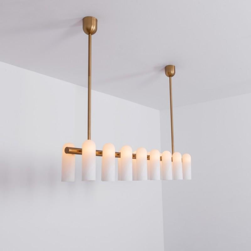 Brass linear chandelier 16 by Schwung
Dimensions: W 182 x D 31 x H 132 cm
Materials: brass, frosted glass

Finishes available: Black gunmetal, polished nickel, brass
Other sizes available

 Schwung is a german word, and loosely defined, means