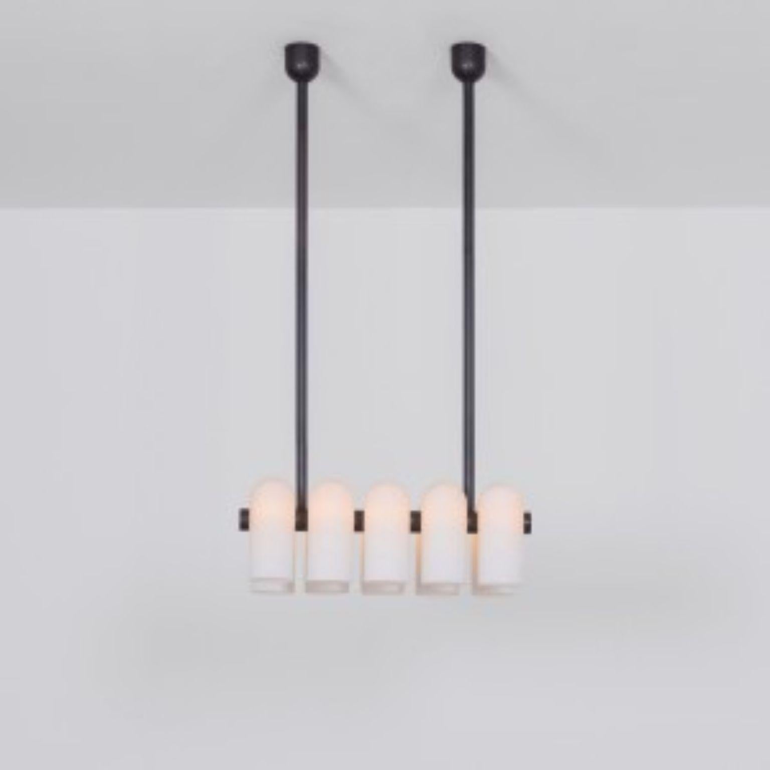 Odyssey Linear SM Black Chandelier by Schwung
Dimensions: W 114 x D 31 x H 132 cm
Materials: Black gunmetal and frosted glass

Finishes available: Black gunmetal and polished nickel
Other sizes available

Schwung is a German word, and loosely