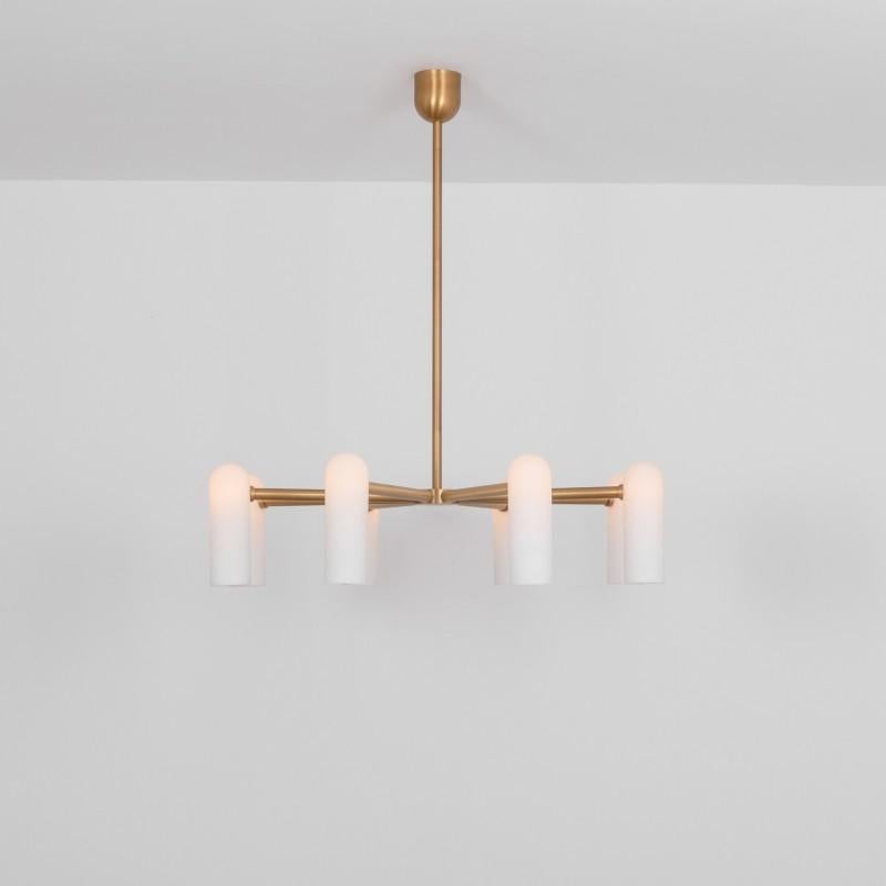 Odyssey round MD brass chandelier by Schwung
Dimensions: W 119 x D 119 x H 131 cm
Materials: Solid brass and frosted glass

Finishes available: black gunmetal and polished nickel
4 other sizes available

Schwung is a German word, and loosely