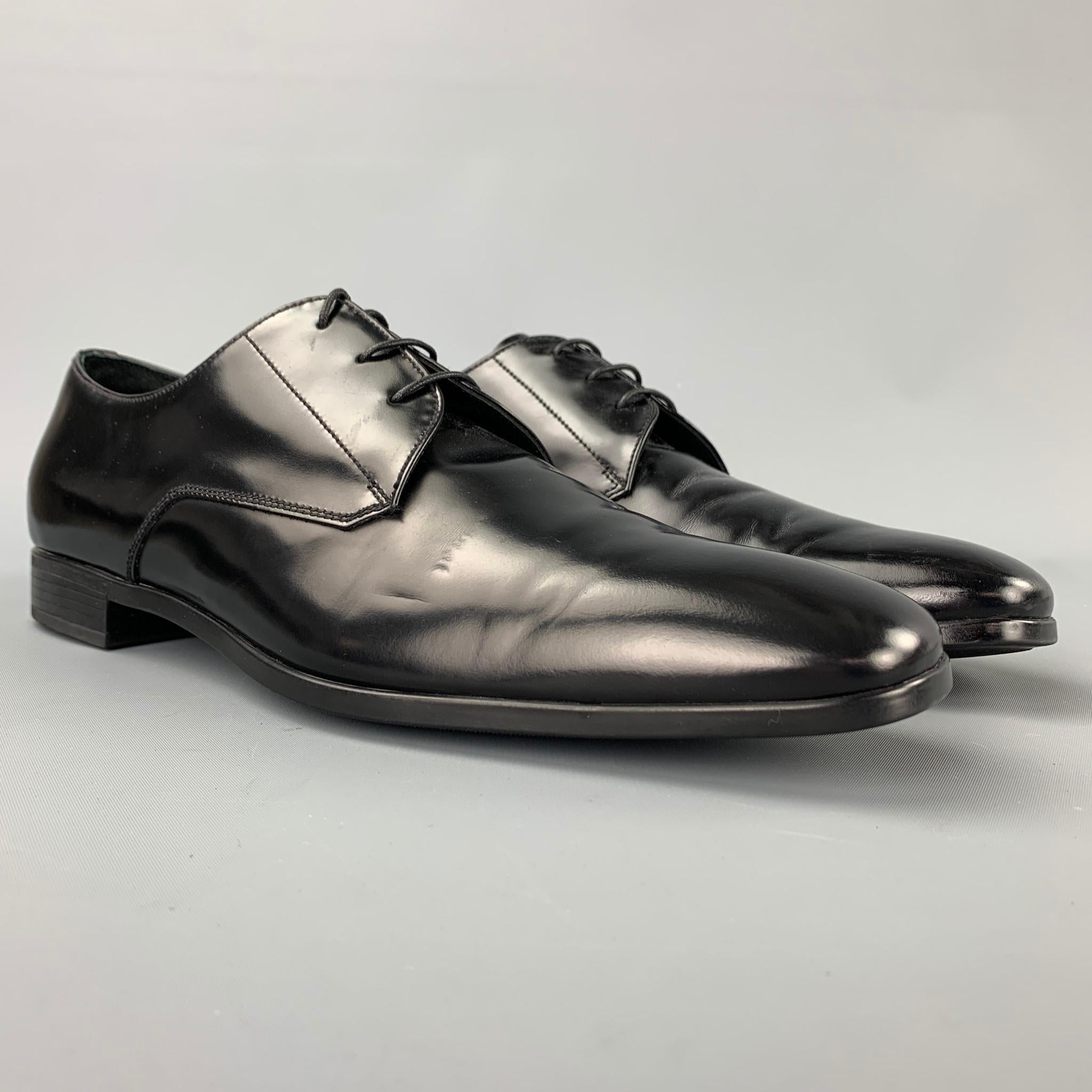 PRADA dress shoes comes in a black leather featuring a square toe, rubber sole, and a lace up closure. Made in Italy.

Very Good Pre-Owned Condition.
Marked: 2EC 071 9

Outsole: 12 in. x 4 in. 