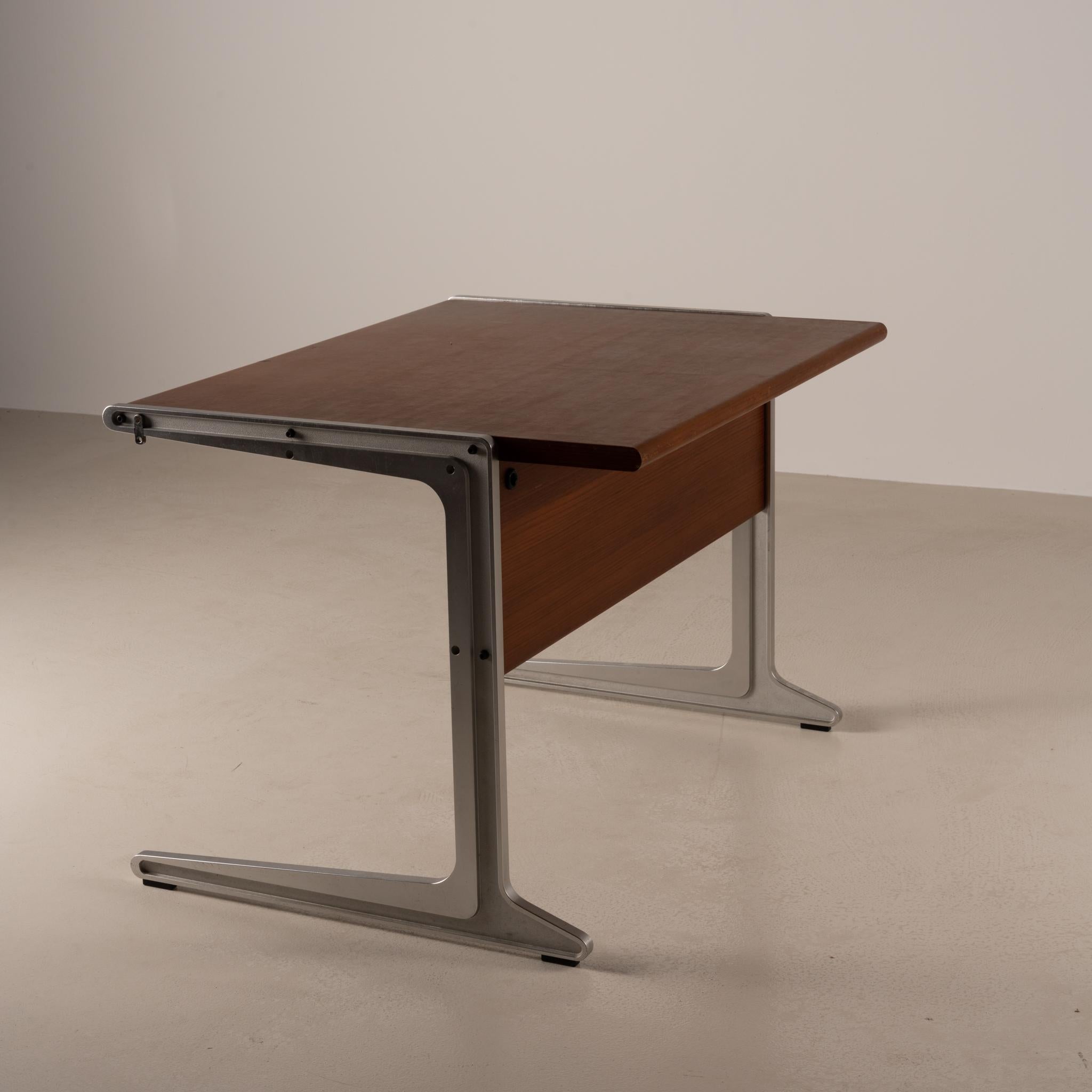 This desk has been designed by Isamu Kenmochi for OF Group 1 Collection at Tendo Mokko in 1971. It has 2 drawers with slots for office equipment and the manufacturer's label under the table top.

Japanese Modern : Isamu Kenmochi Retrospective,