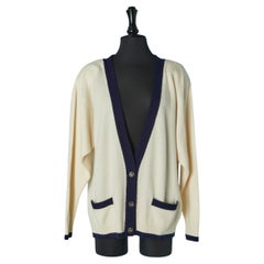 Off-white and navy cashmere knit cardigan with branded button CHANEL