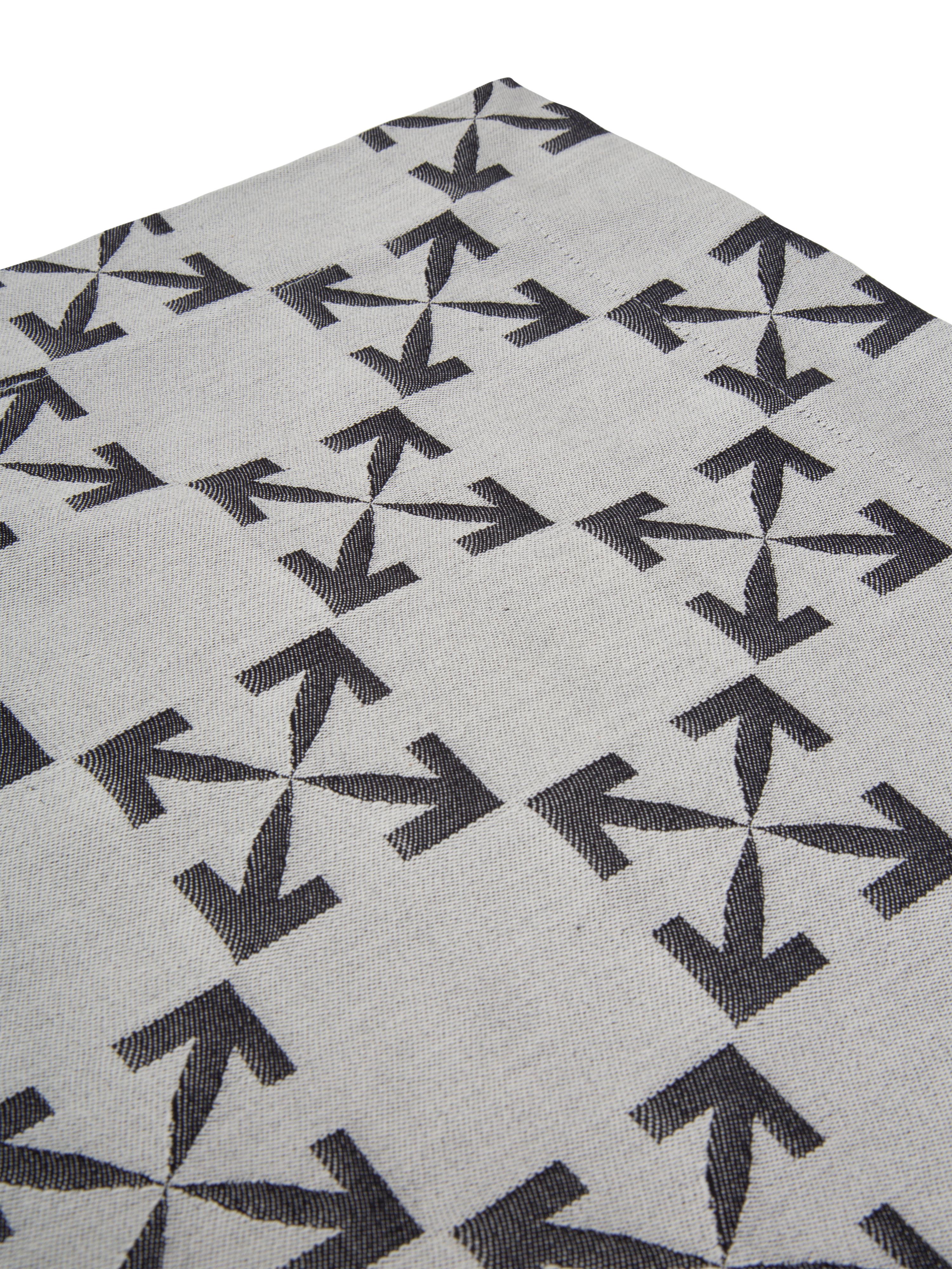 Kitchen textiles in Taupe and Black colors, with Arrow pattern in jacquard. HOME Orange Tyvec label on a side
By Virgil Abloh
Dimensions: 145 W x 240 H
This item is only available to be purchased and shipped to the United States.
  