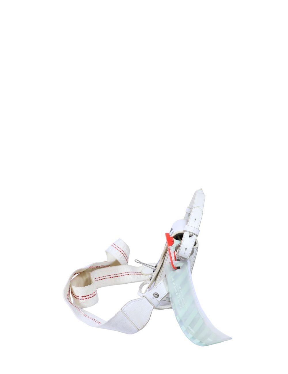 Make a streetwear statement with this Off-White mini binder clip bag, designed in sleek white leather and printed with the brand's iconic black diagonal stripes. Featuring a silver-tone binder clip closure, adjustable strap, and signature Off-White