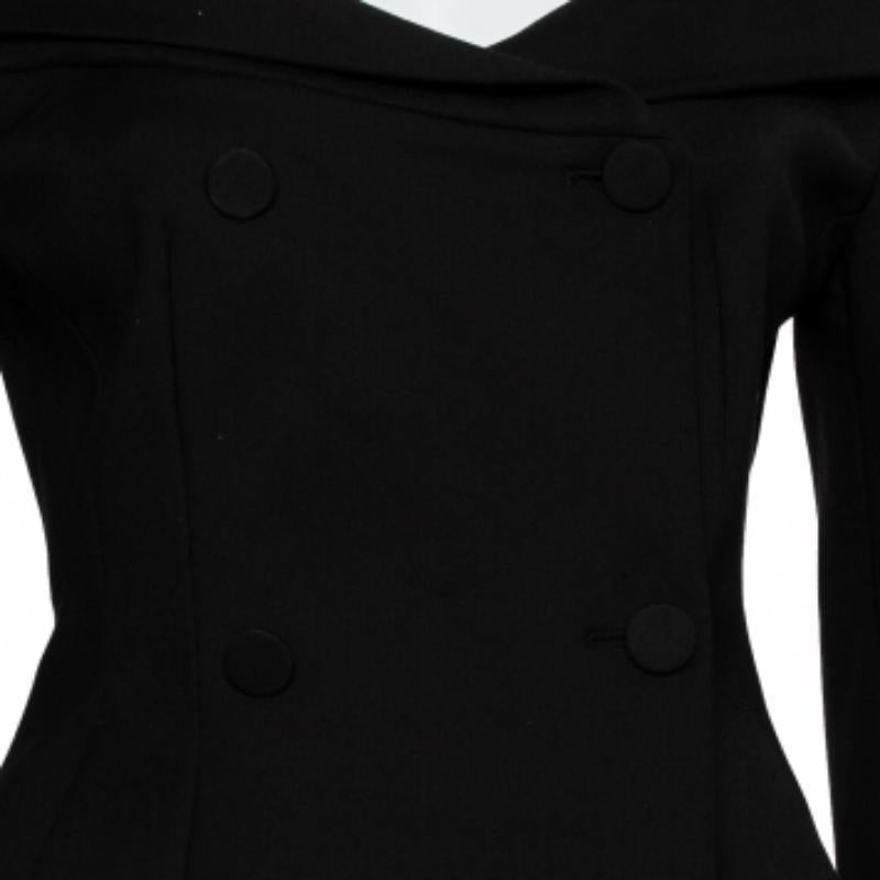 This blazer from Off-White is one item your closet will love. The crepe creation carries a black hue, an off-shoulder design with an asymmetrical hemline, and long sleeves. Cut into a silhouette that is extremely stylish and flattering, this classic