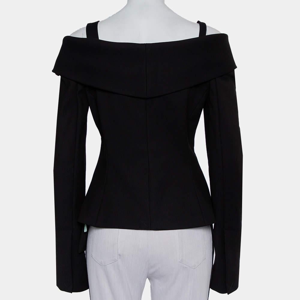This blazer from Off-White is one item your closet will love. The crepe creation carries a black hue, an off-shoulder design with an asymmetrical hemline, and long sleeves. Cut into a silhouette that is extremely stylish and flattering, this classic